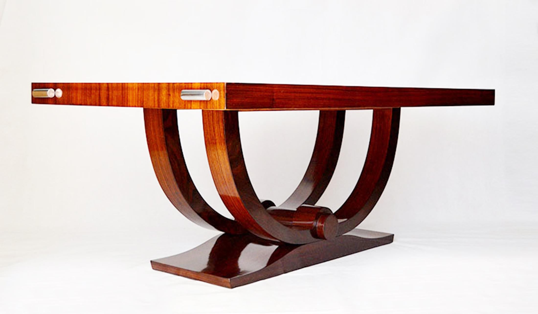 Large Art Deco table with double arch base in extendable Indian rosewood,
France,
circa 1930
Good vintage condition
Dimensions: 76 x 100 x 200 cm (50 + 50)
Documentation: attached 