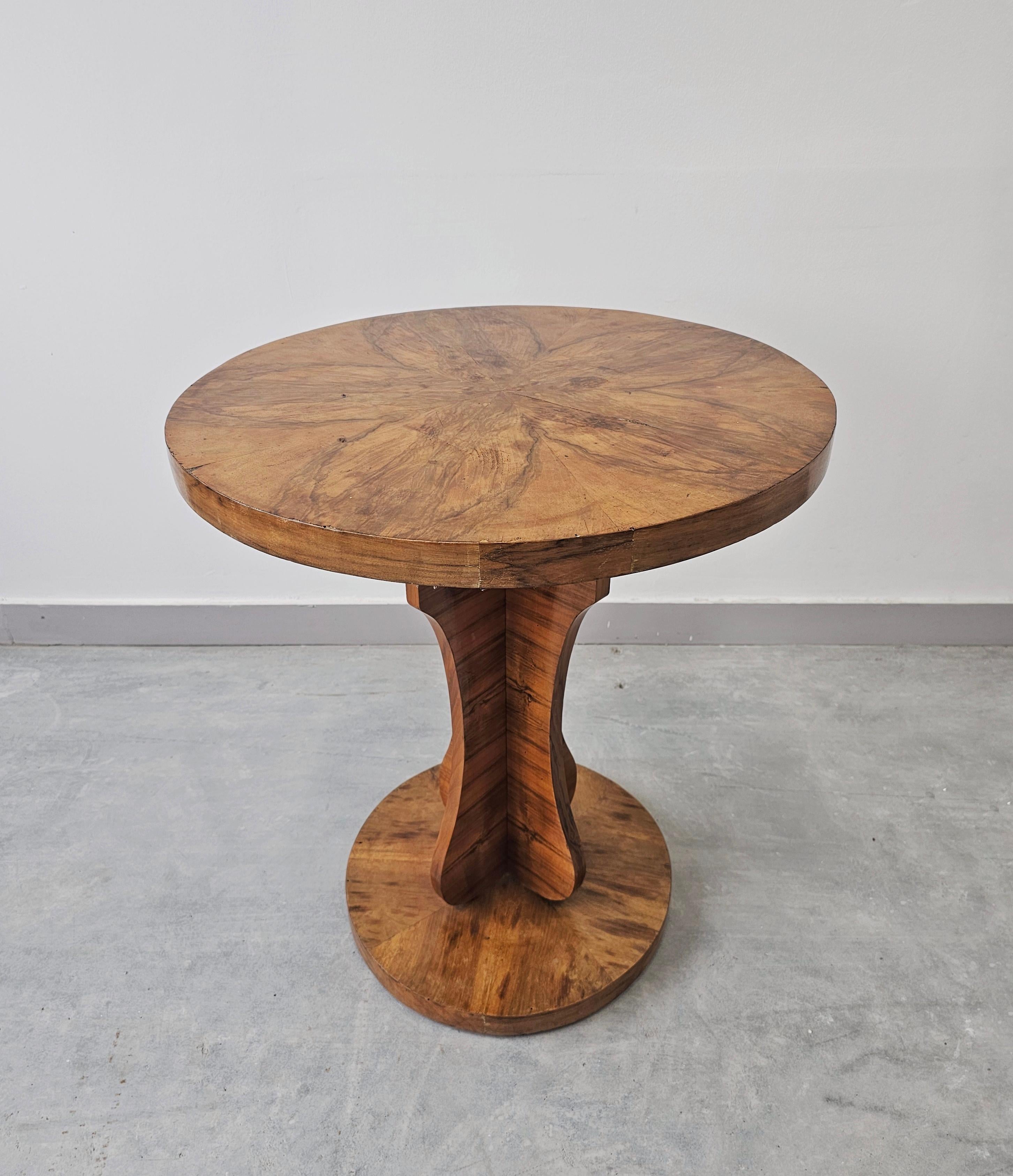 In this listing you will find a gorgeous Art Deco table which could be use in various occasions and purposes - as a central table in a hallway for large vase or pot with flowers, as a tiny dining table, or as a decorative side table. It features a