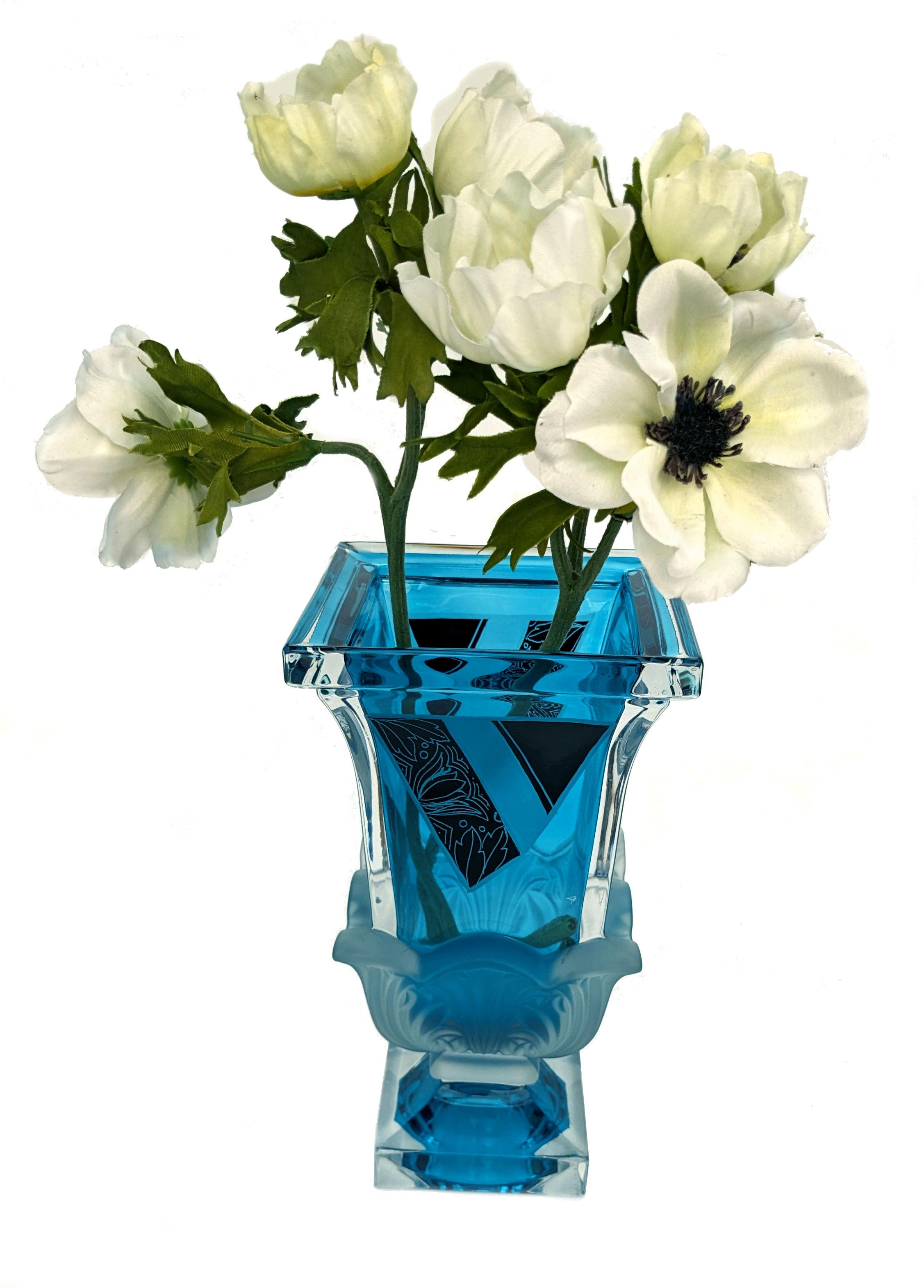 Standing just over 25 cm tall we offer for your consideration is this exceptional 1930's Art Deco glass vase, and what a gem it is! It's beautifully elegant and with the most glorious geometric decoration. Features clear and blue glass with jet