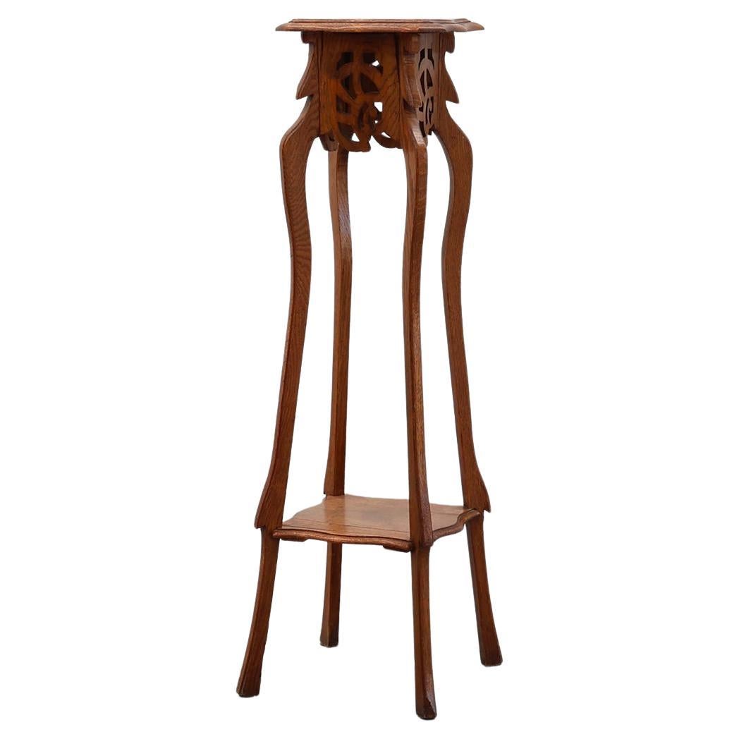 Art Deco tall pedestal in oak with 2 levels, France ca. 1915