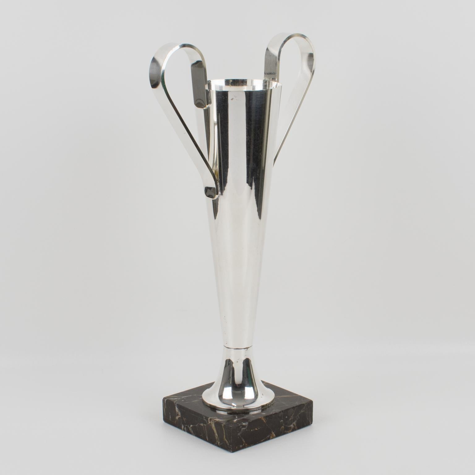 An elegant French Art Deco tall silver plate vase designed with wide handles on a marble base. This vase could be a trophy. This vessel has a streamlined tulip shape ornate with sturdy handles and stands on a square black Portor marble base. There