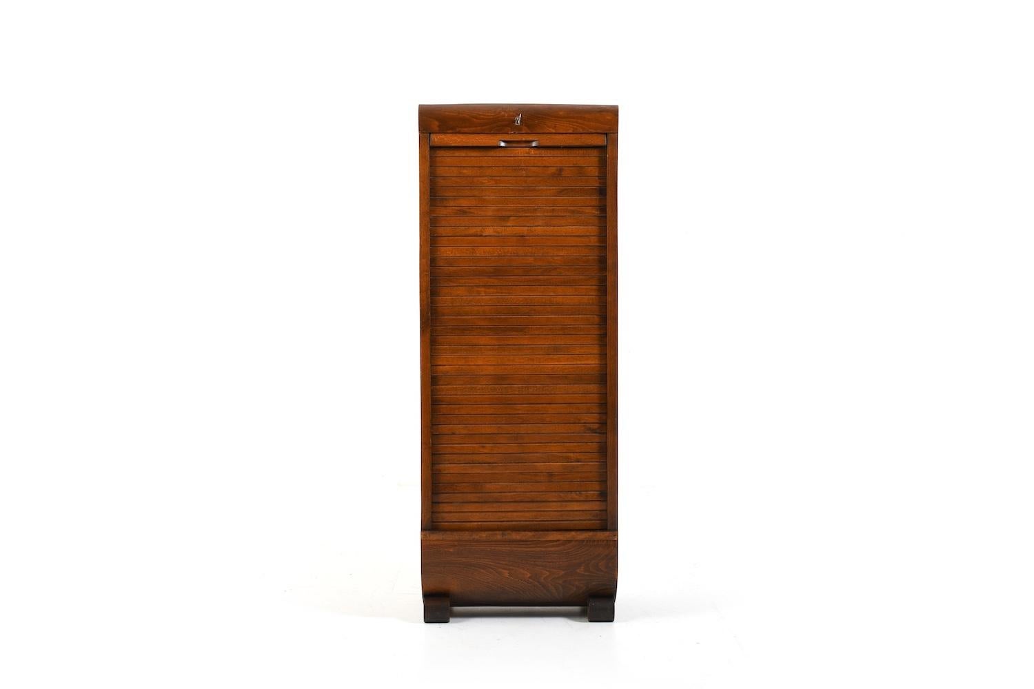 Danish Art Deco tambour door file cabinet with drawers inside in birch wood. Round legs. Prod. 1920s -1930s. 