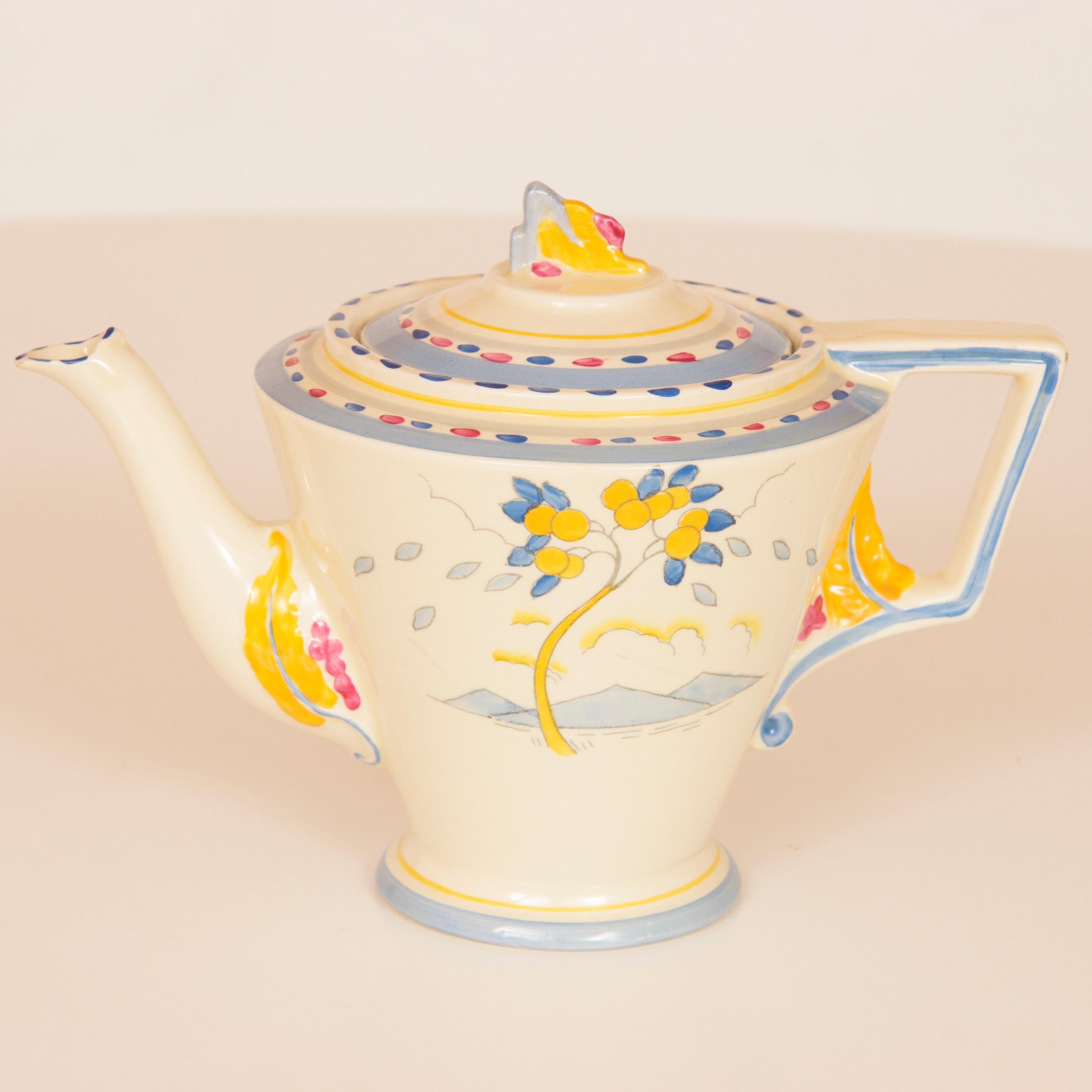 Art Deco hand-painted tea and dinner service.
A rare set in the lemon tree design by Burleigh ware on the Art Deco Zenith shape,, complete service for 12 place setting, with two large and two small tureens and 5 platters, soup ladle and two under