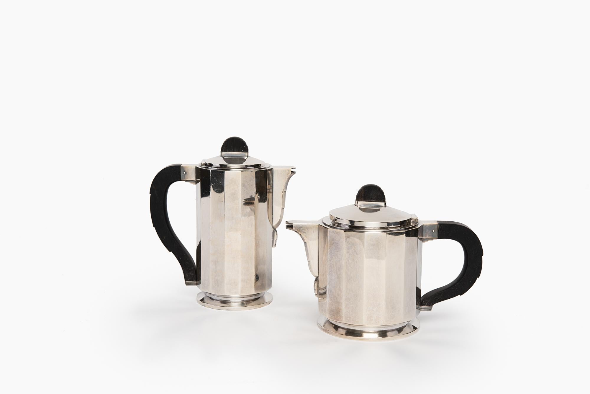 Particular and elegant tea/coffee service; it consists of 4 pieces: teapot, coffee pot, milk jug, and sugar bowl; the silver plated is excellent, with a thickness higher than average and a very strong silver plating, in fact, the mark 