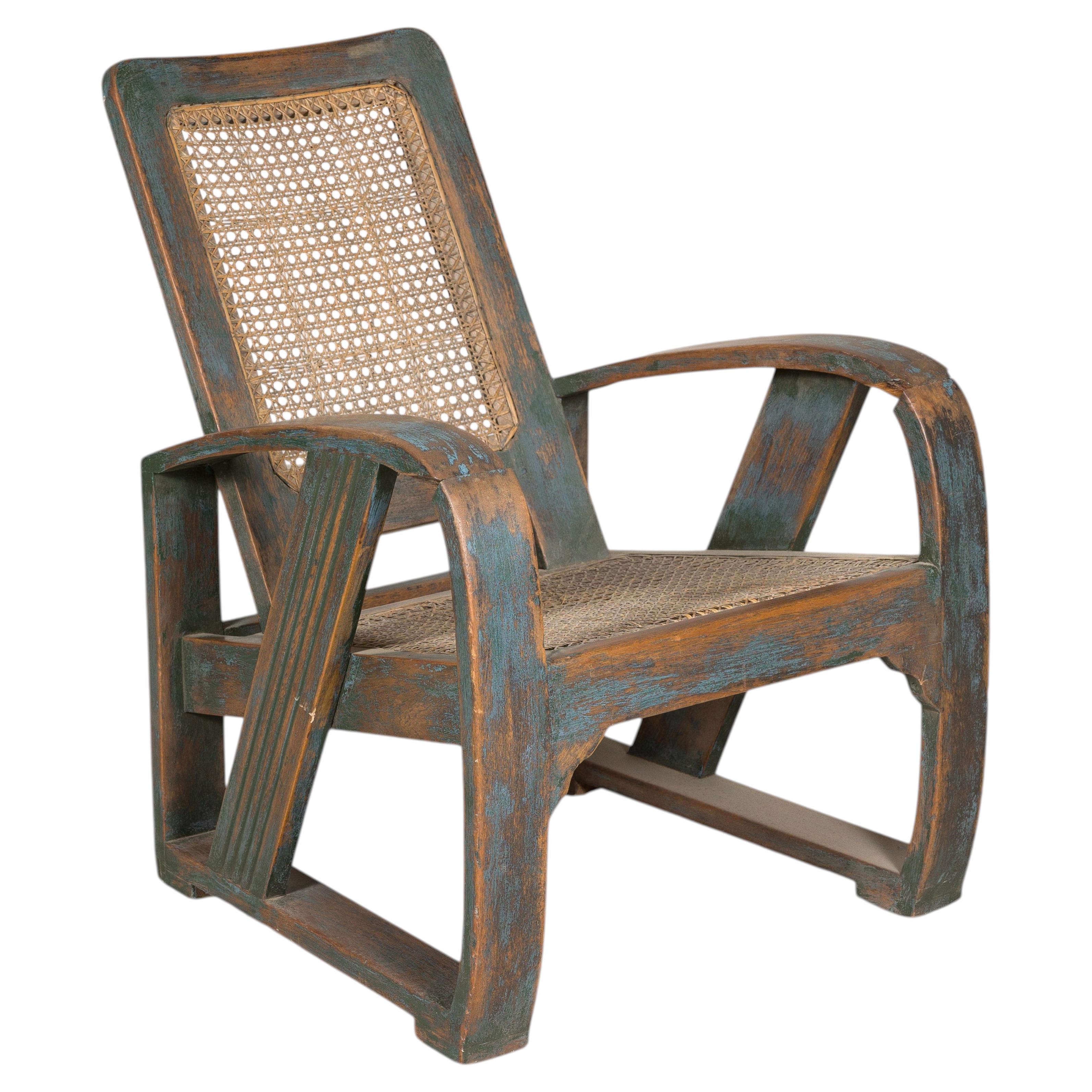 Art Deco Teak and Cane Lounge Chair with Traces of Blue Paint For Sale