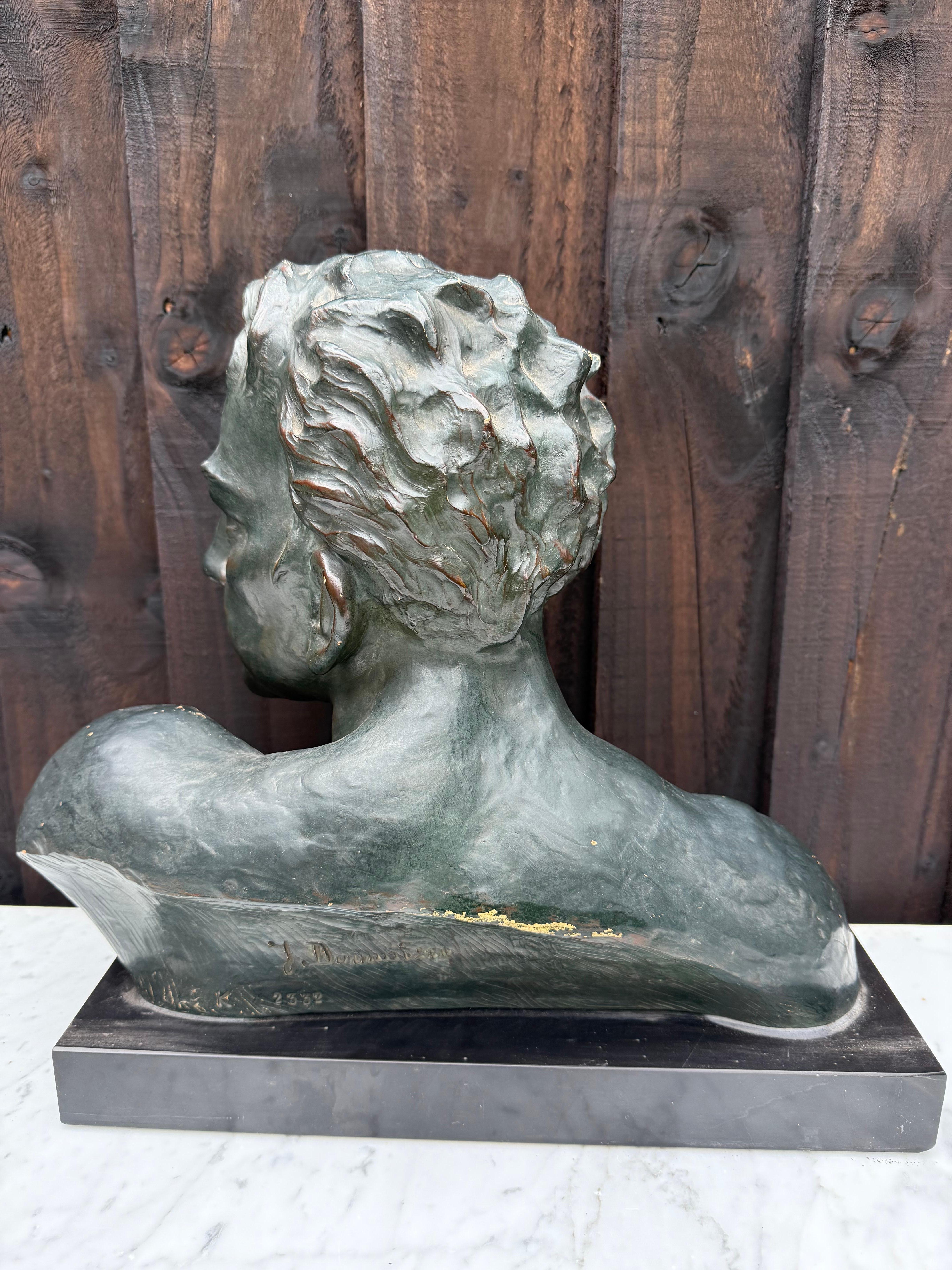 Art Deco terracotta bust of a man , J Dommisse 2