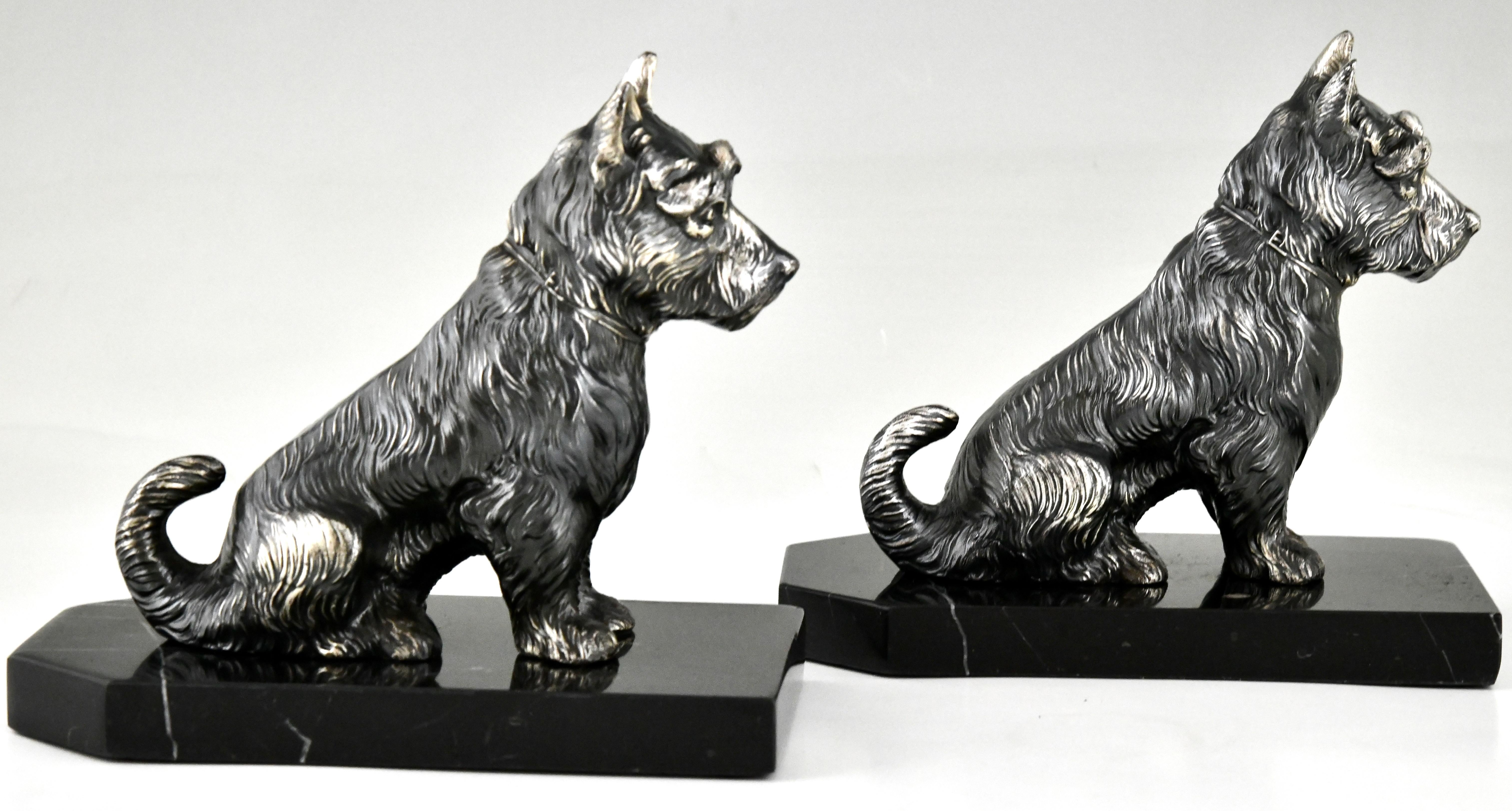 Metal Art Deco terrier dog bookends by Hippolyte Moreau, France 1930.  For Sale