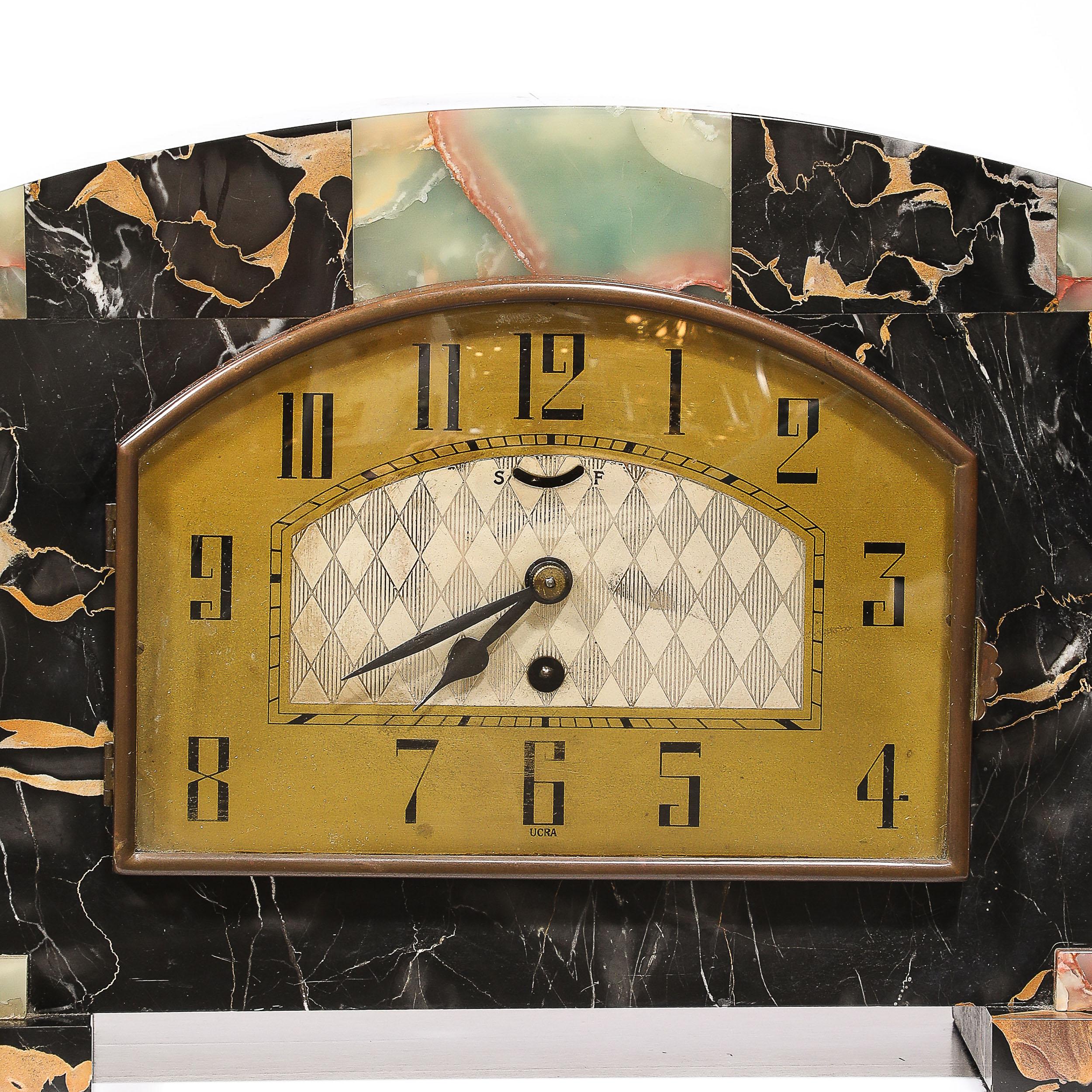 French Art Deco Tessellated Marble , Onyx  & Brass Mantlepiece Clock signed Ucra  For Sale