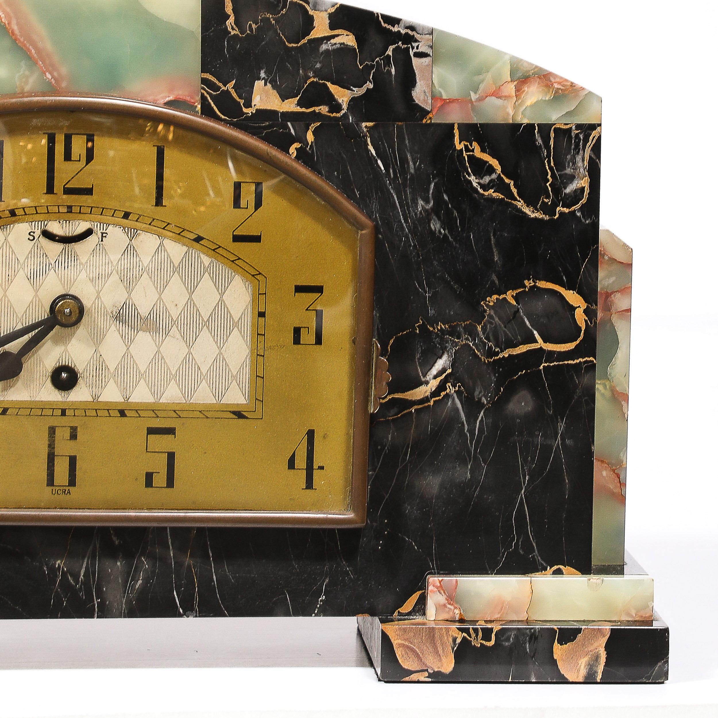 Mid-20th Century Art Deco Tessellated Marble , Onyx  & Brass Mantlepiece Clock signed Ucra  For Sale