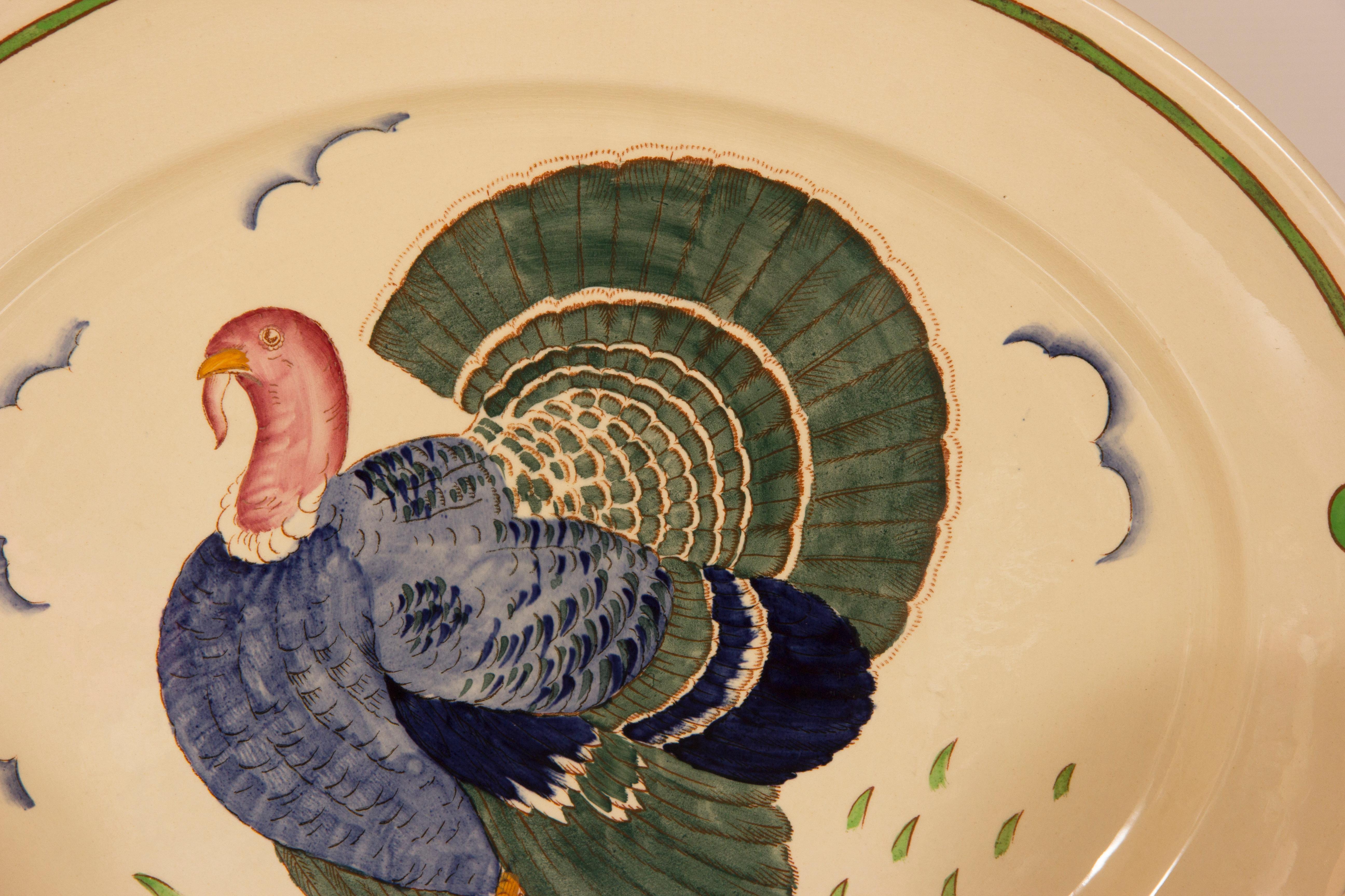 Art Deco Thanksgiving set, hand-painted Turkey design by Harold Bennett for Burgess and Leigh, Harold was the Art director at Burgess and Leigh.
Measures: Large plate W: 45 cm D: 38 cm
Small plate W: 25 cm D: 25 cm
British, circa 1930.