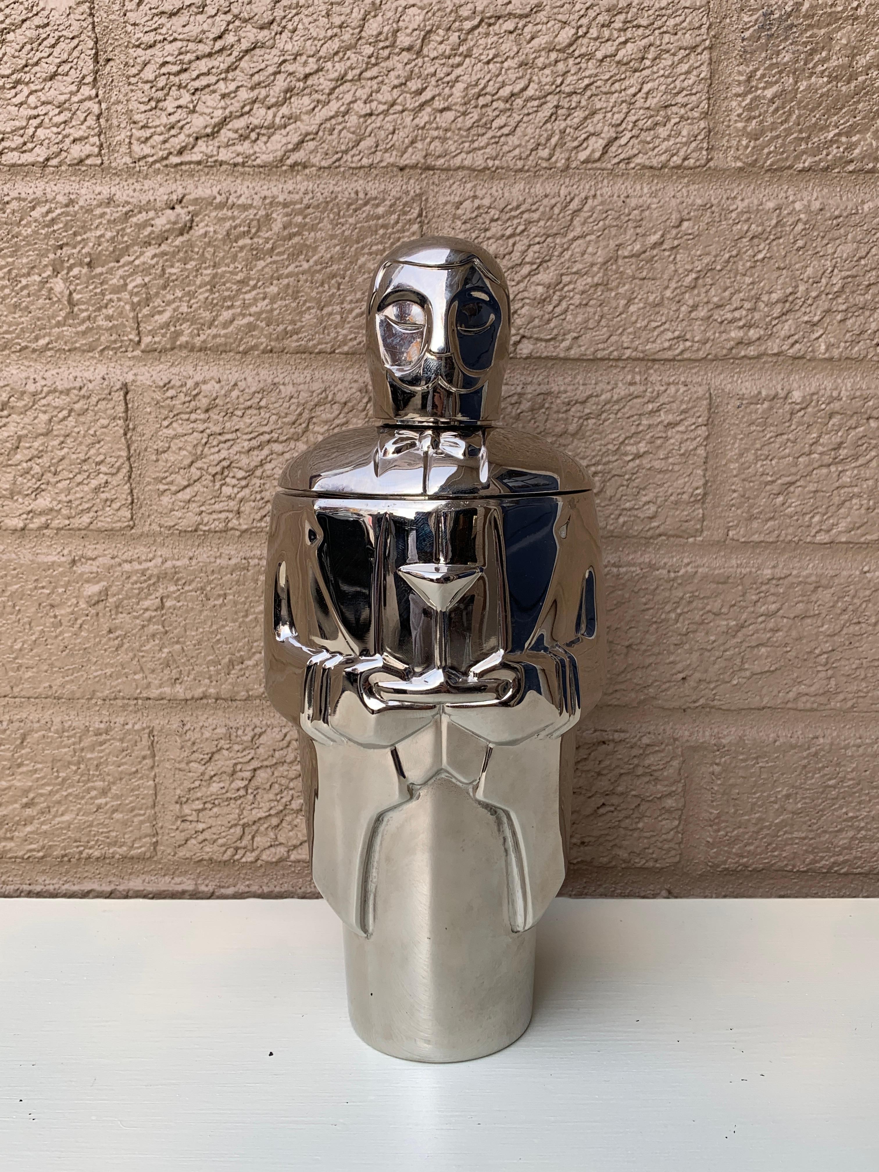A chic and rare Art Deco style stainless steel cocktail or martini shaker in the form of 