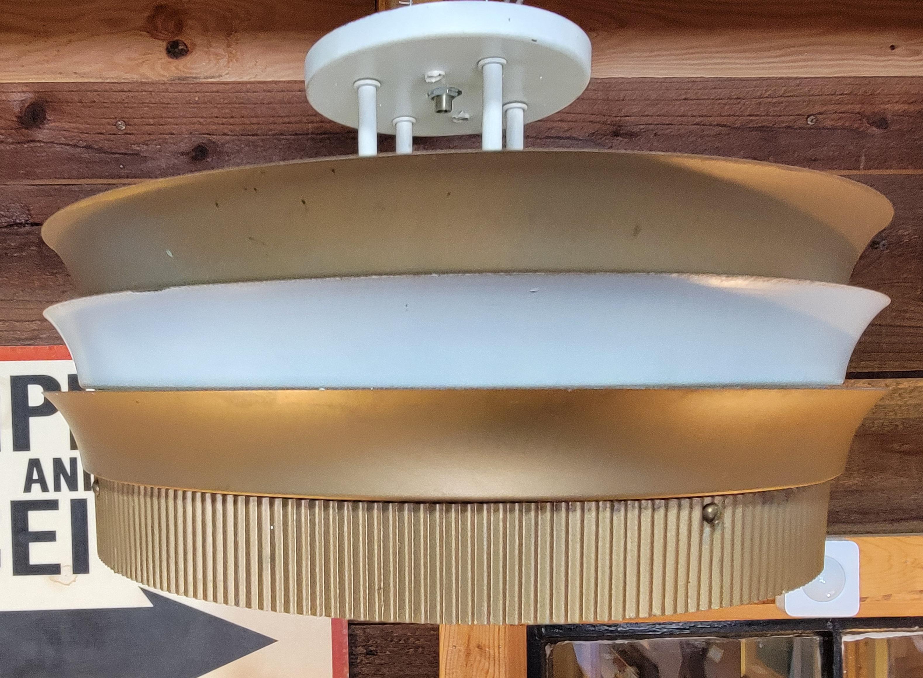Authentic Art Deco era theater flush mount ceiling fixture. Salvaged from the Encore Theater in Burlingame, California. Painted metal concentric rings with etched glass shades. Holds 4 standard light bulbs. Original finish, original wiring. We also