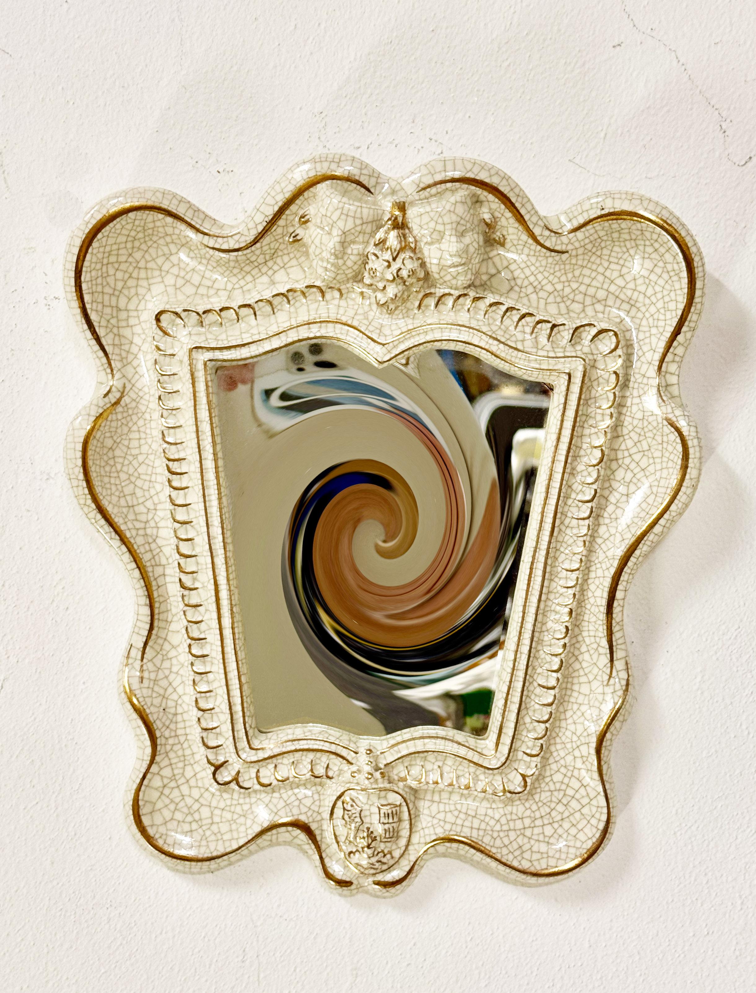 Raro espejo con marco de ceramica con hermosa craqueladura. Fabricado en 1930 en Austria por Gmundner Keramik 

