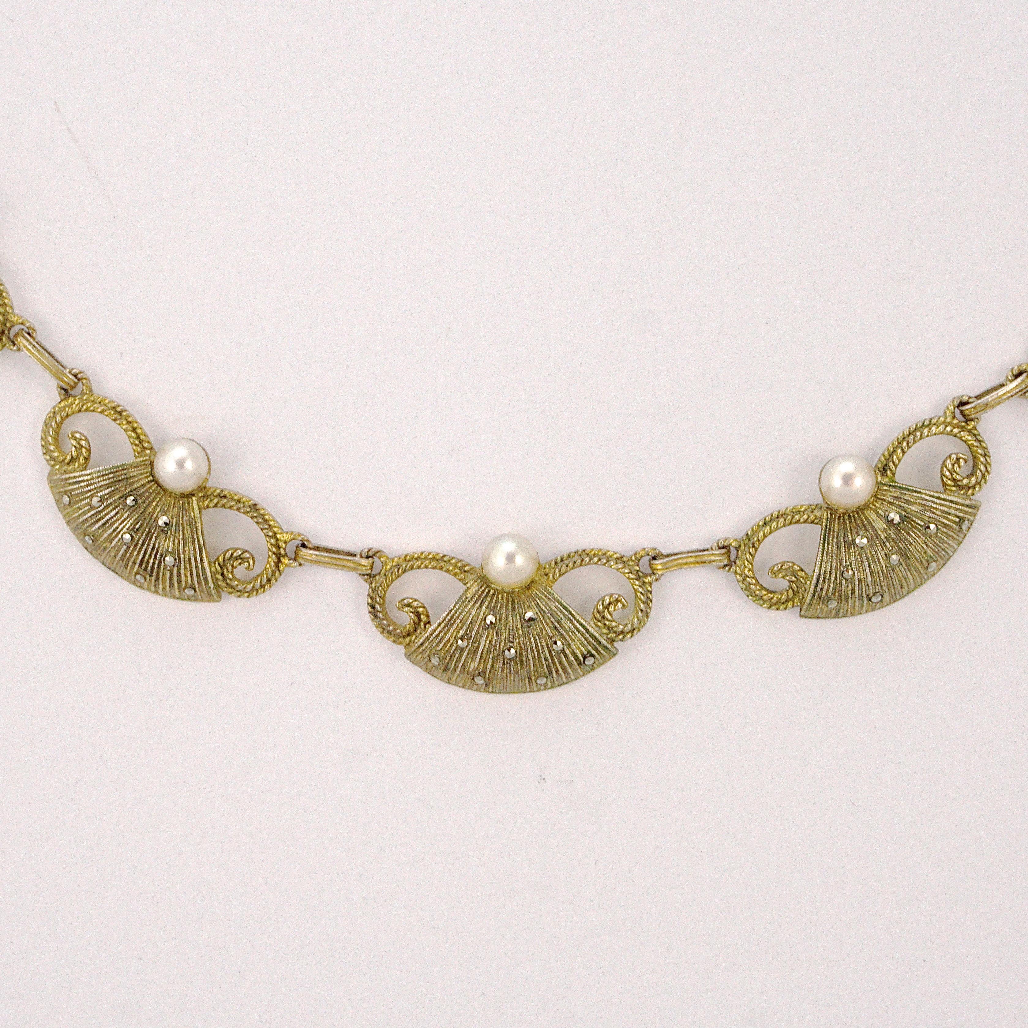 Superb Art Deco Theodor Fahrner sterling silver gilt textured necklace, designed with five beautiful links embellished with marcasites and cream cultured pearls, and a rectangular link chain with marcasites. The back is smooth. Measuring length