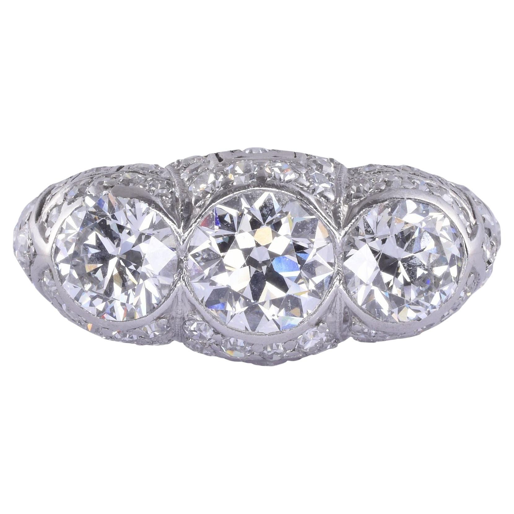 Art Deco Three Center Diamond Platinum Ring For Sale