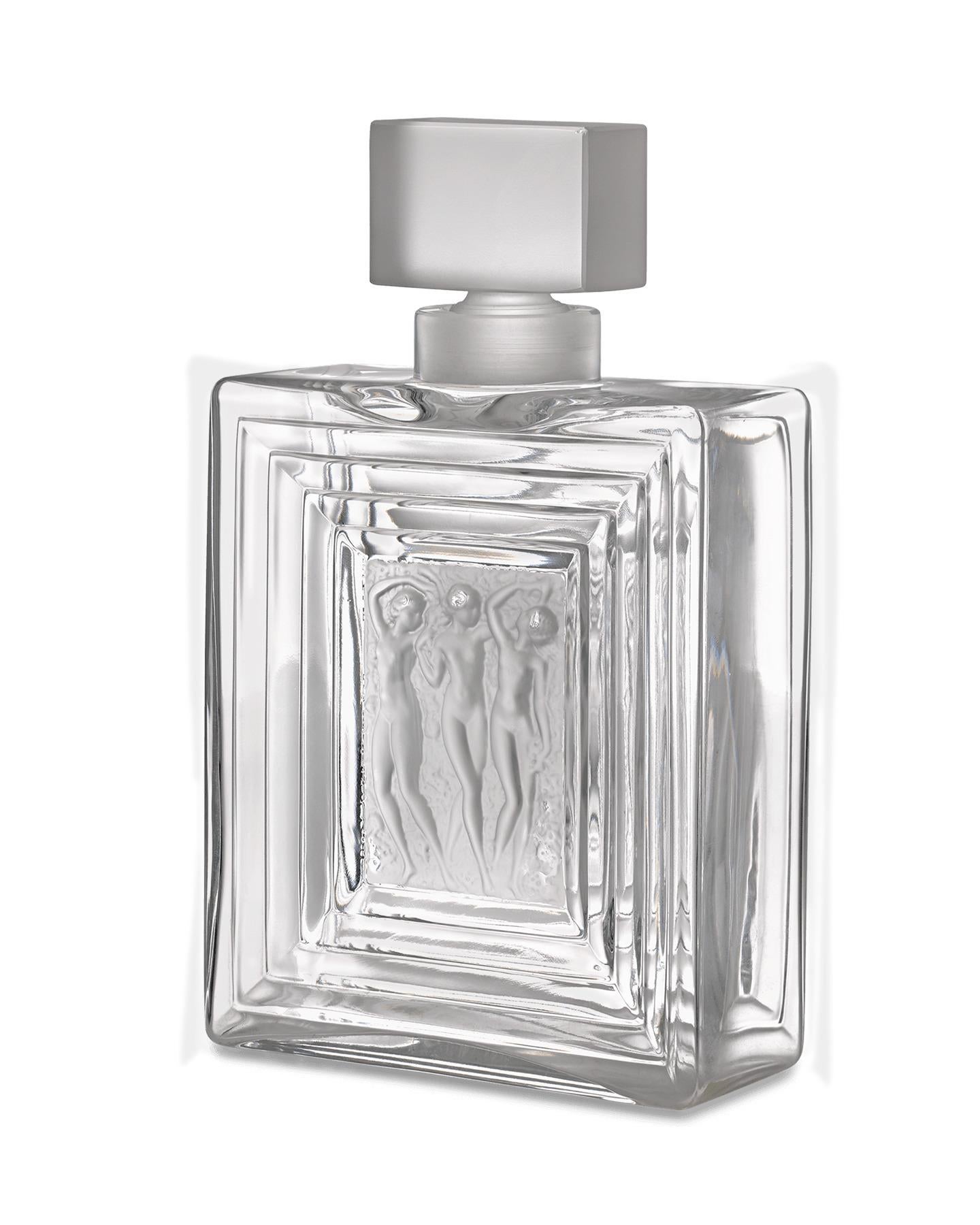 Crafted by famed French cristallerie Lalique, this stately Art Deco-era decanter is exemplary of the crystal masterpieces that garnered Lalique its extensive fame in the 20th century. The handsome angular vessel is comprised of clear and frosted