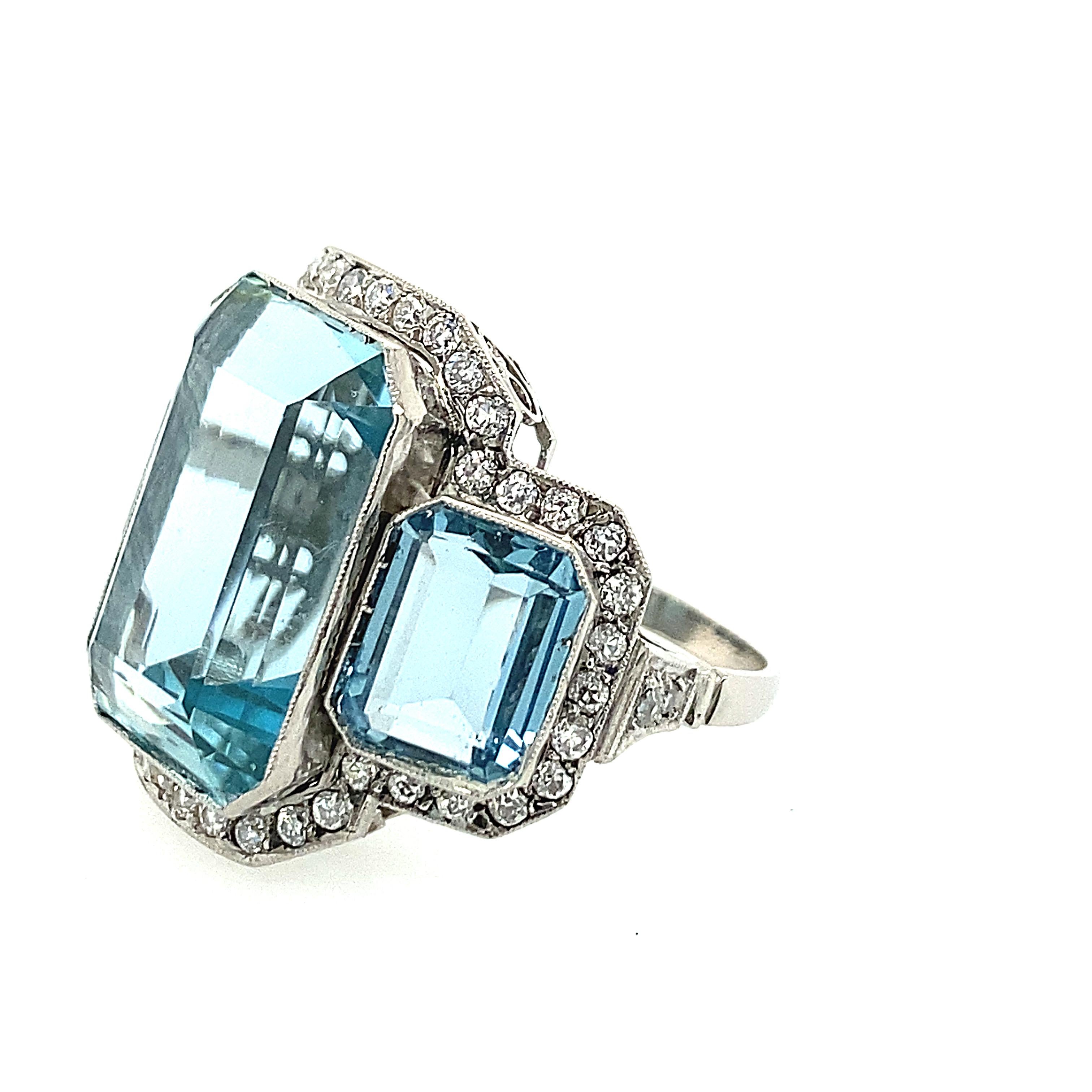 Aquamarine and Diamond Ring with three aquamarine stones that weigh 17.60carats. Art Deco Style in platinum. Approximately 1.20carats of white diamonds.