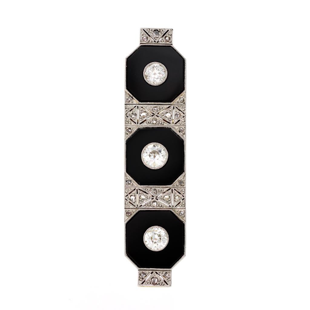 Mixed Cut Art Deco Three-Stone Brooch with Diamonds Onyx Set in Platinum and 14 Karat Gold For Sale