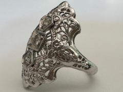 Art Deco Three-Stone Diamond and Filigree Dinner Ring