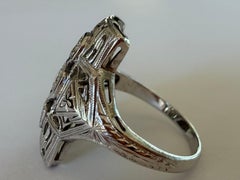 Art Deco Three-Stone Diamond and Filigree Dinner Ring