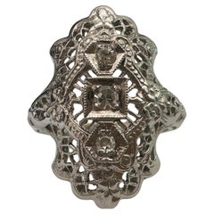 Art Deco Three-Stone Diamond and Filigree Dinner Ring