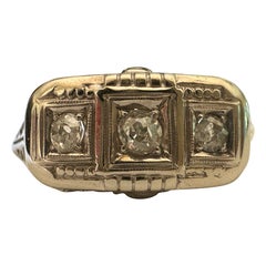 Art Deco Three-Stone Diamond and Filigree Ring
