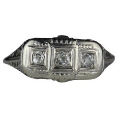 Art Deco Three-Stone Diamond and Filigree Ring