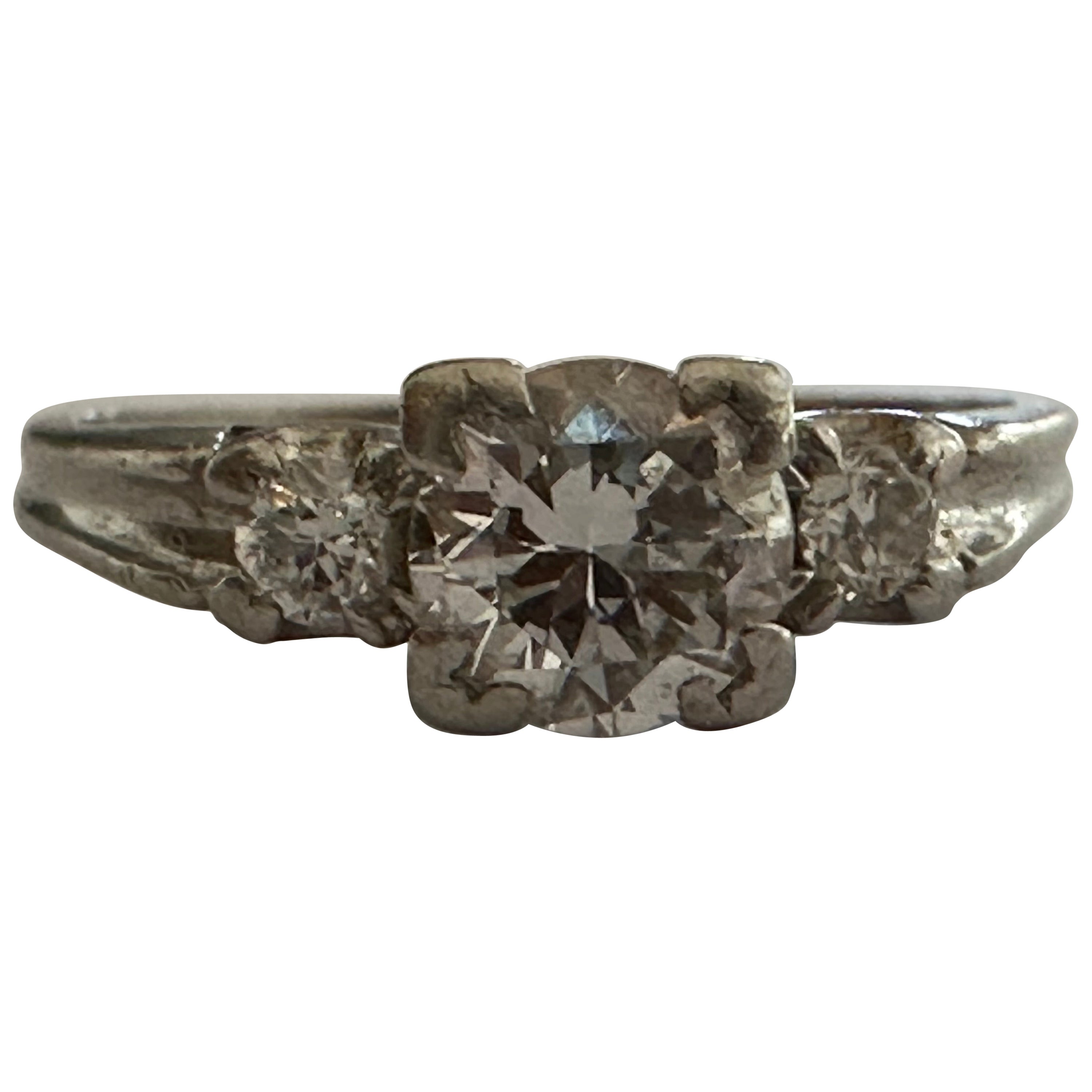 Bague de fiançailles Art déco à trois pierres et diamants
