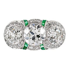 Art Deco Three-Stone Diamond Ring with Emeralds