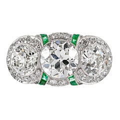 Art Deco Three-Stone Diamond Ring with Emeralds