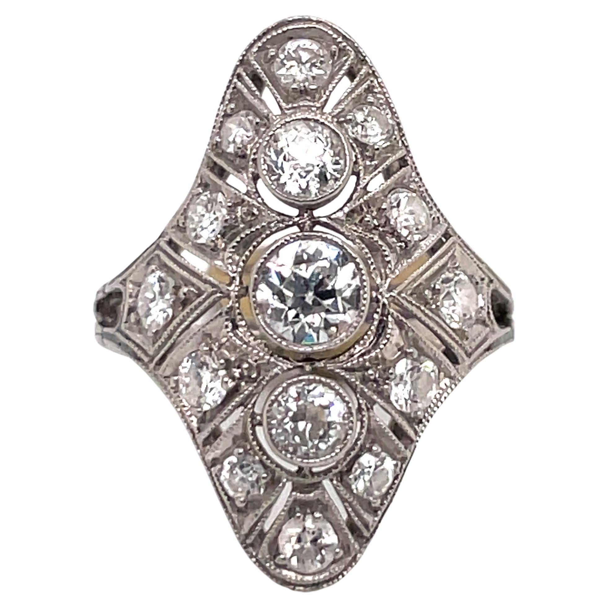 Art Deco Three Stone Filigree Ring 1.20 Carats Platinum 4.2 Grams For Sale