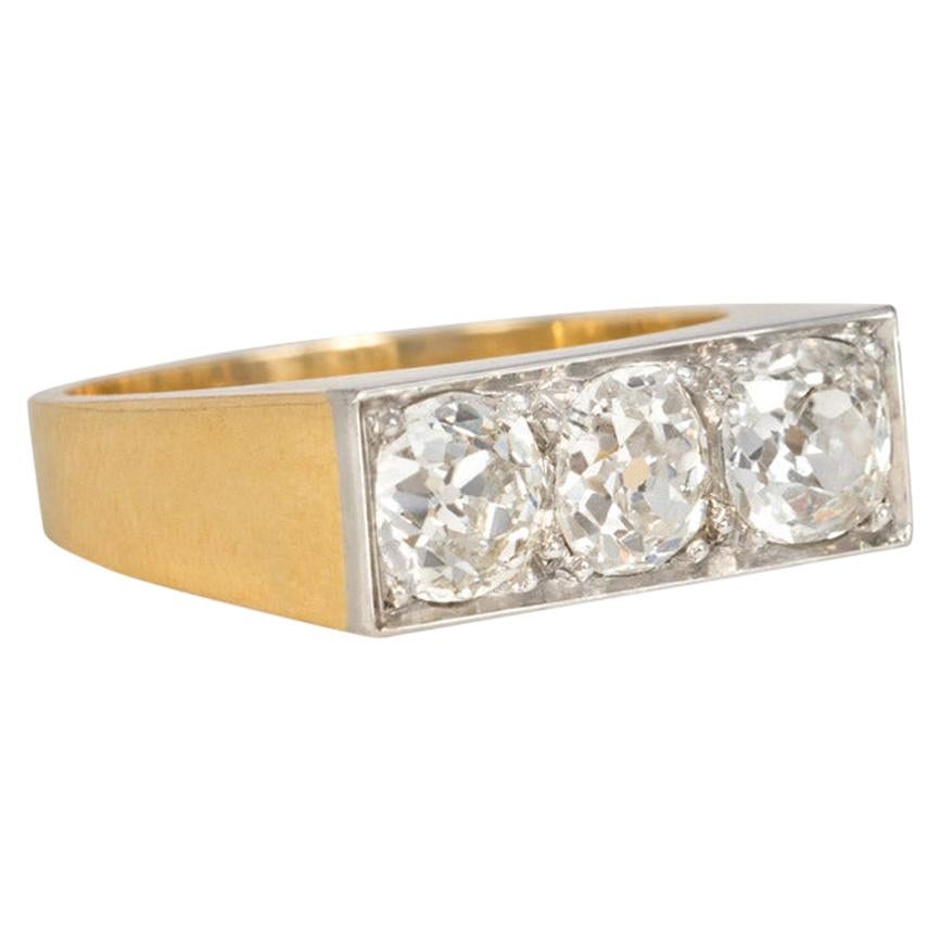 Art Deco Three-Stone Old Mine Cut Diamond, Gold, and Platinum Band-Style Ring
