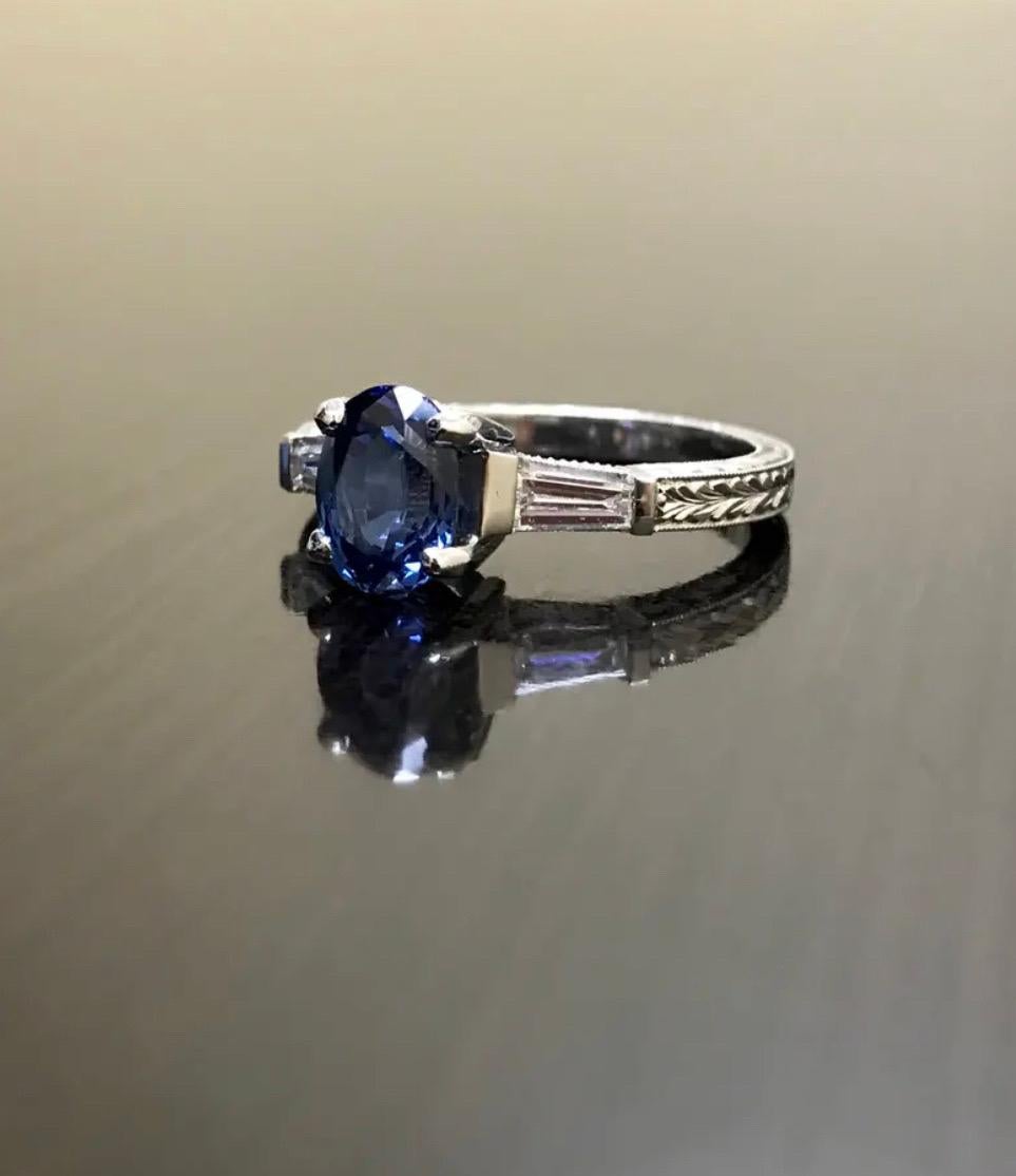 DeKara Designs Collection

Beautiful Modern/Art Deco Ceylon Blue Sapphire and Diamond Ring

Metal- 90% Platinum, 10% Iridium

Stones- Natural Oval Ceylon Blue Sapphire 2.00 Carats, 2 Baguette Diamonds, F-G Color VS1 Clarity, 0.30 Carats.

Size-6.