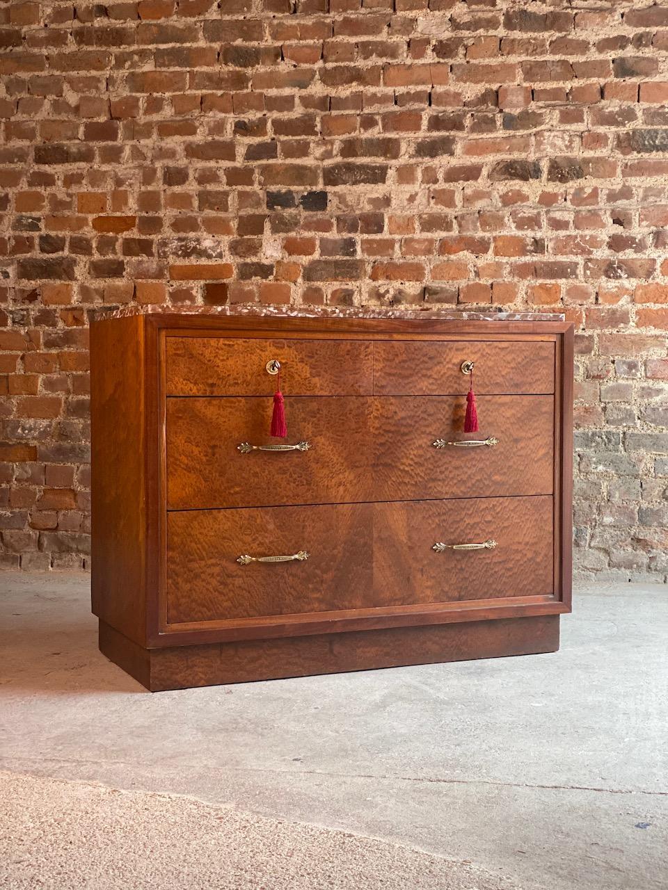 Art Deco Thuya marble-top commode chest of drawers, France, circa 1930

Magnificent early 20th century Art Deco continental Thuya marble-topped commode, France, circa 1930, The rectangular top with reddish brown with white veined Italian marble