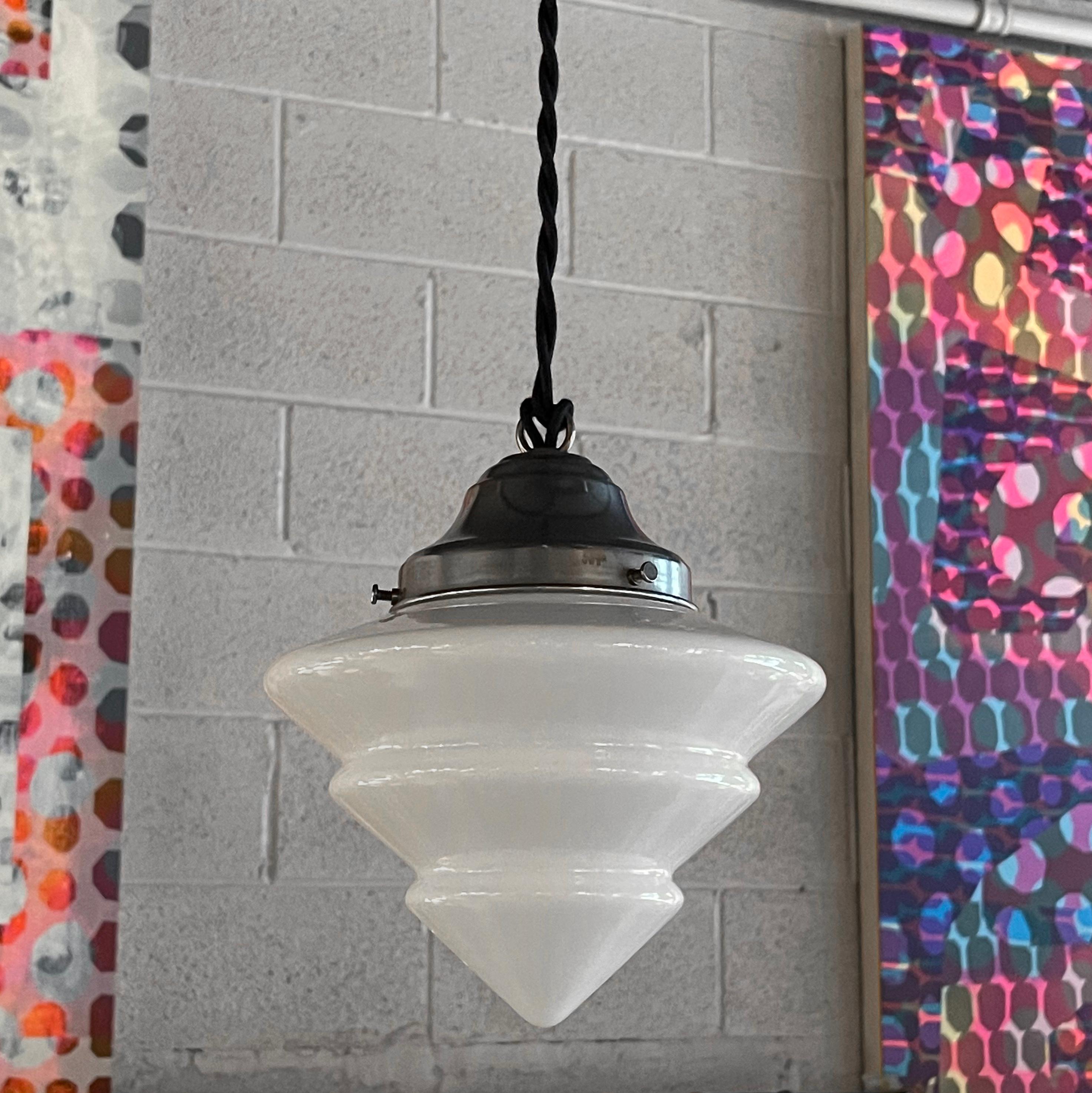 Art Deco pendant light with tiered milk glass cone shade and aluminum fitter is newly wired with 40 inches of braided black cloth cord.