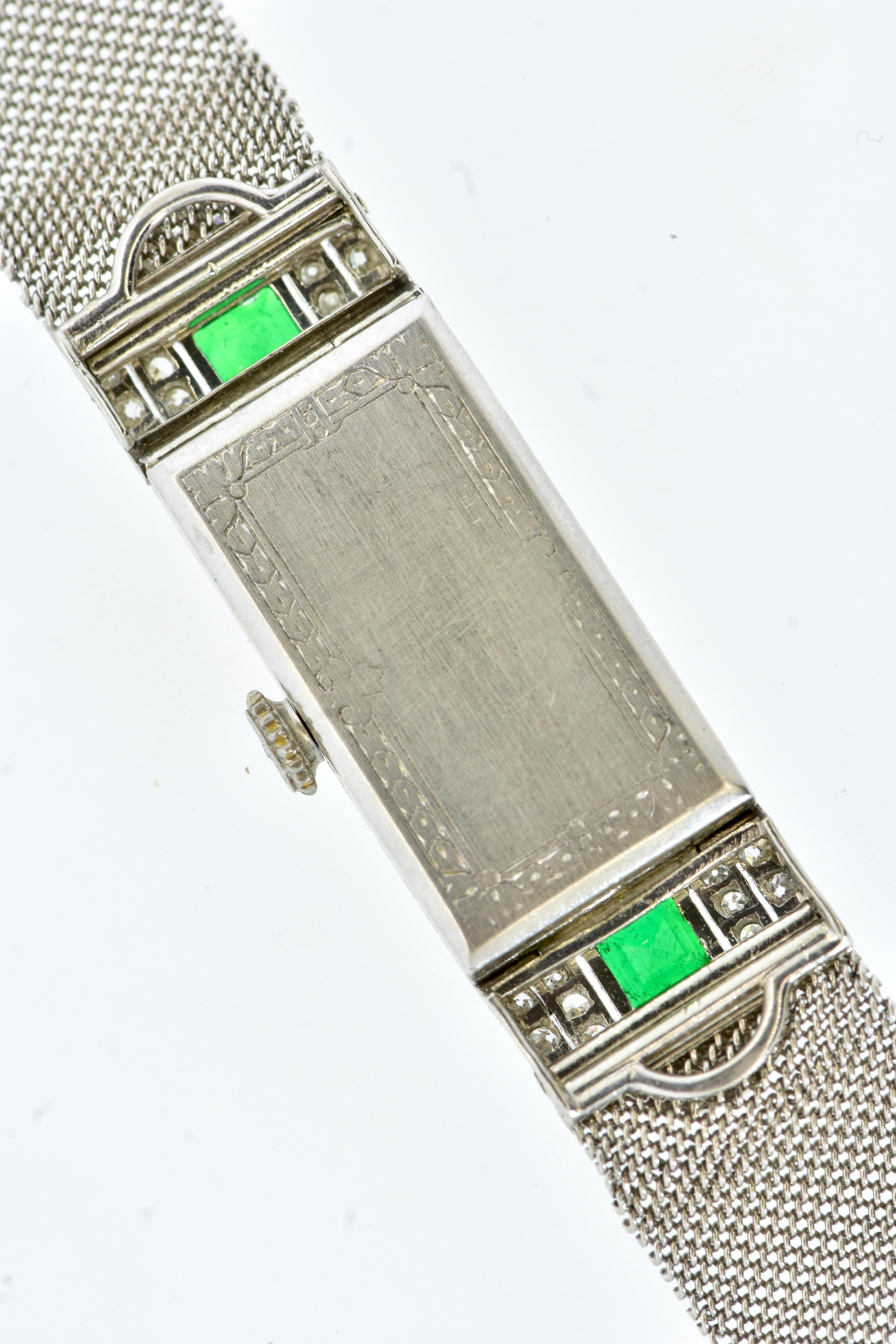 Art Deco Tiffany Platinum, Diamond and Emerald Wristwatch, c. 1920. 11