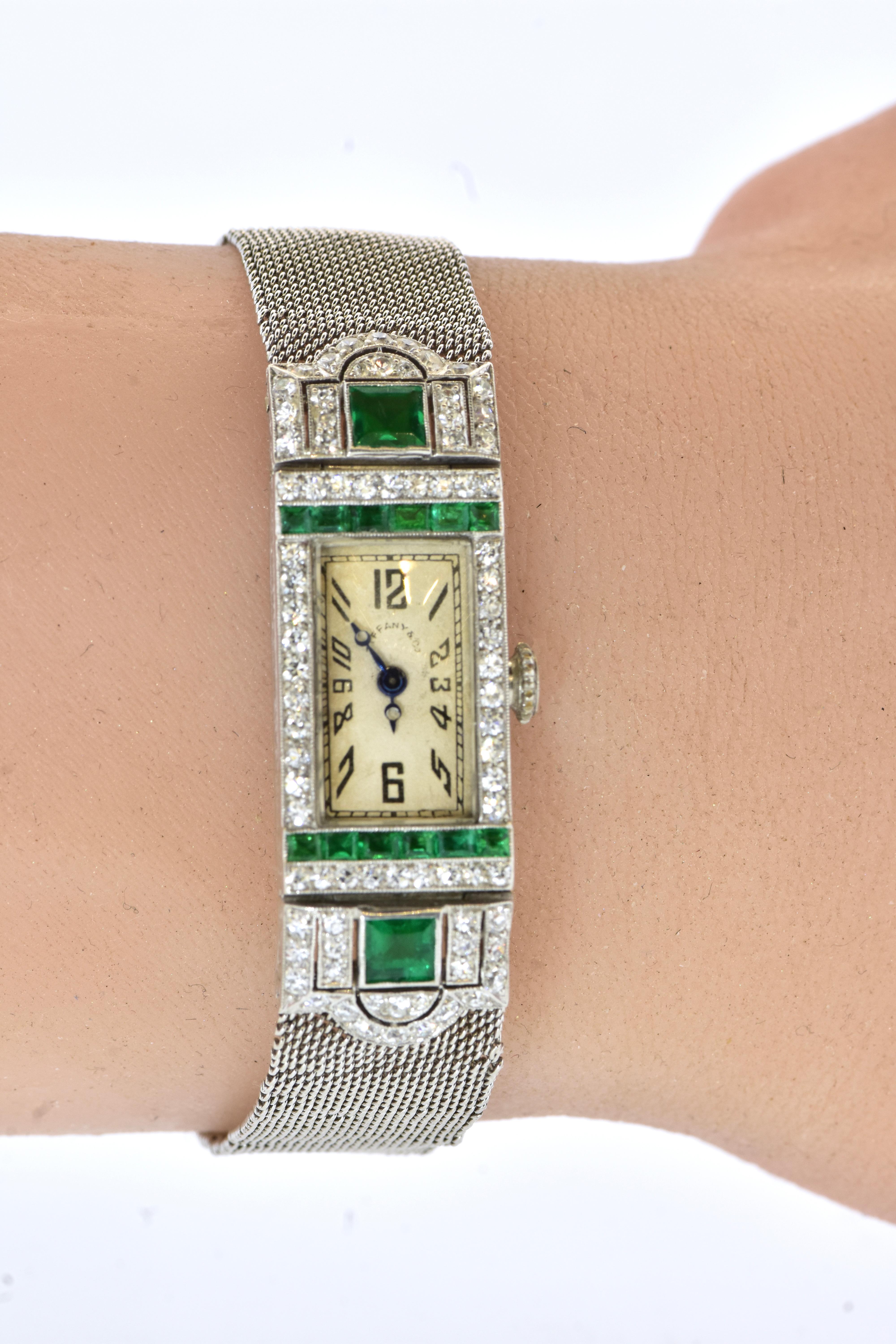 Art Deco Tiffany & Co. diamond, emerald and platinum wristwatch.  A sublime period piece by a great House, this is an elegant and striking accent for the lady's wrist.   Fine natural Colombian emeralds weighing an estimated 1.30 cts.  All of the 20