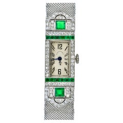 Art Deco Tiffany Platinum, Diamond and Emerald Wristwatch, c. 1920.