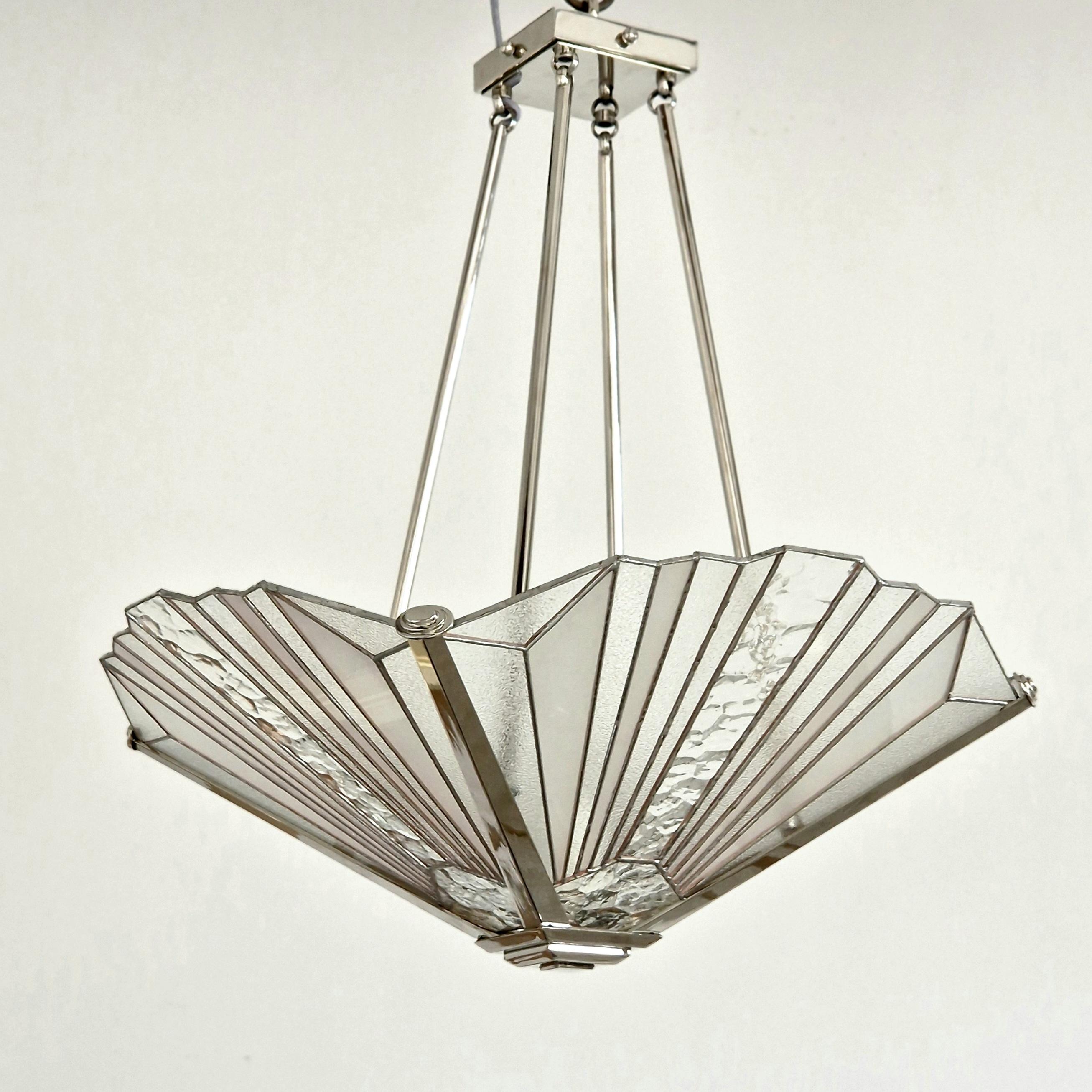 Art Deco bronze chandelier with nickel finish and Tiffany vitrail.