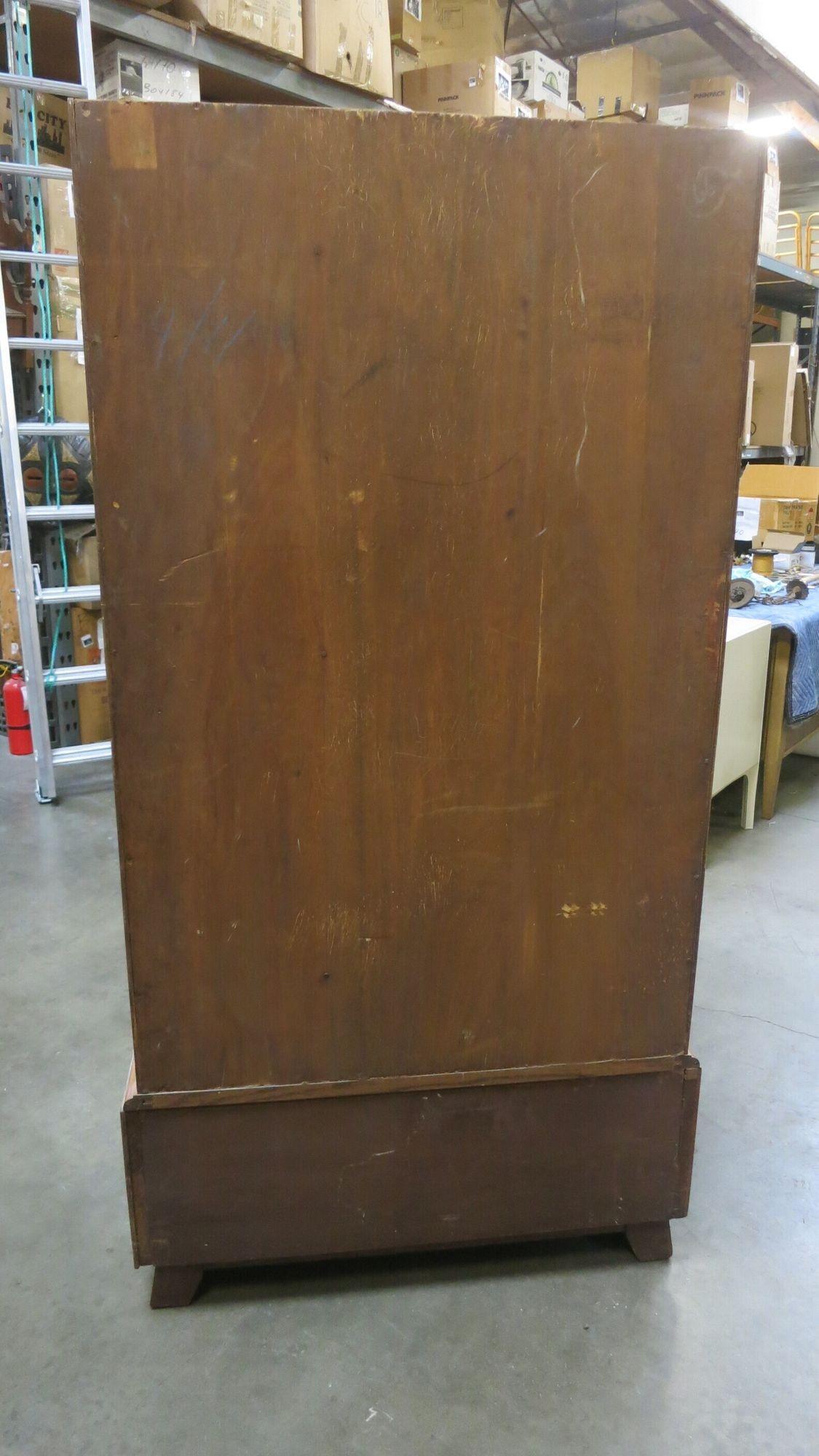 1930 Art Deco Gentleman's Walnut Armoire by Raven Furniture K&T t with original key and fully working locking doors. This wardrobe features a 