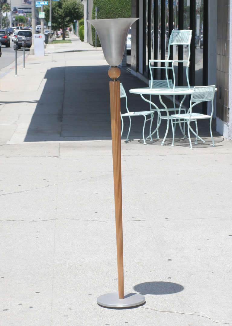 Art Deco carved wood torchiere floor lamp with aluminum shade designed by Russel Wright.