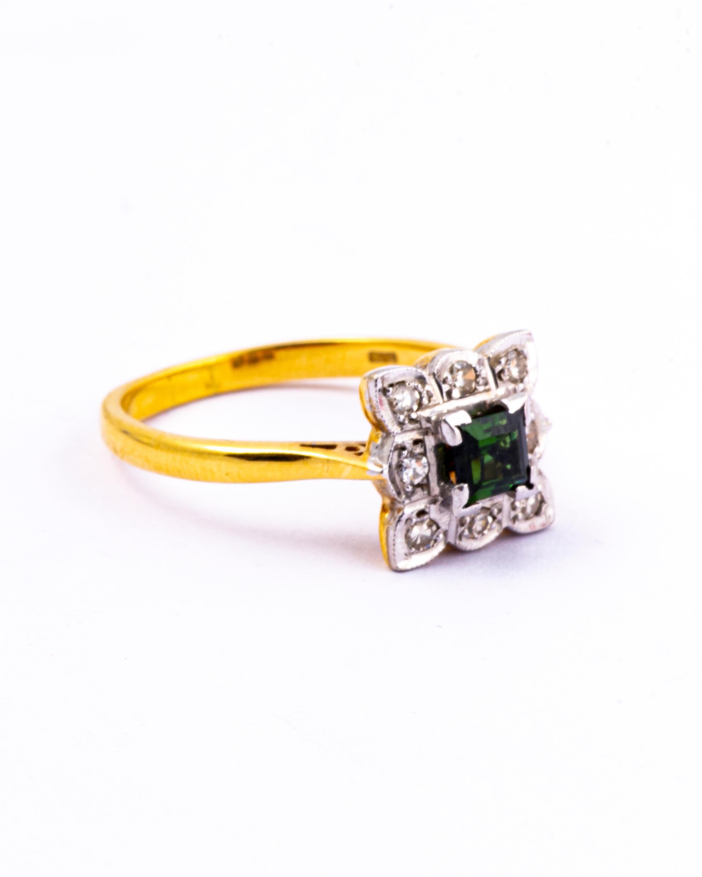 This gorgeous tourmaline is a deep green colour and measures approx 45pts. This stone is surrounded by round cut diamonds totalling approx 25pts. All stones set in platinum. 

Size: O or 7 1/4 
Cluster Diameter: 10x10mm

Weight: 4.5g