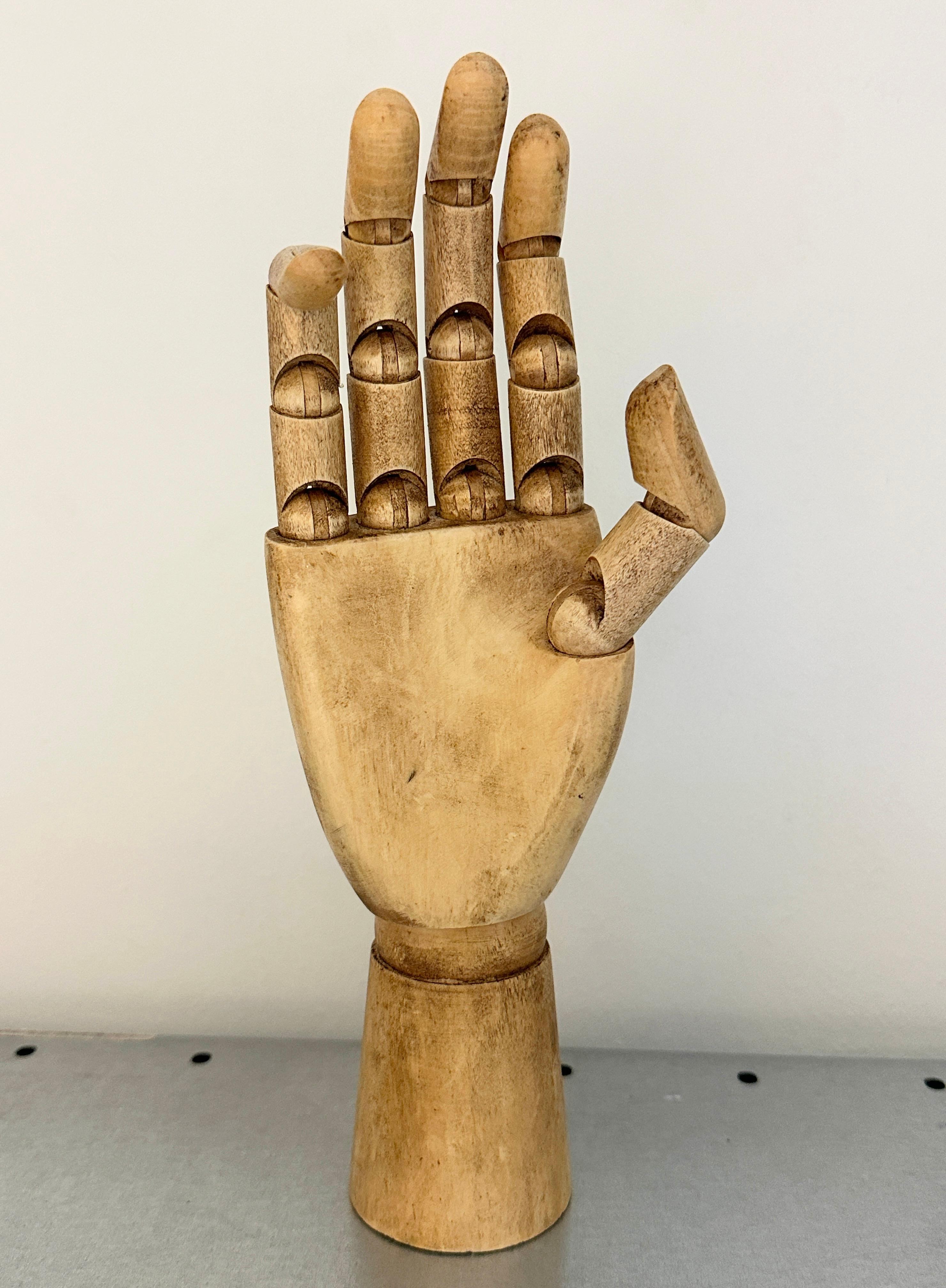 A handmade wooden Artist mannequin hand model - all joints move as they should. Found on an Estate sale in Vienna, Austria.
Shows some minor wear - but looks beautiful on display! Some scratches and a nice patina due to the age.