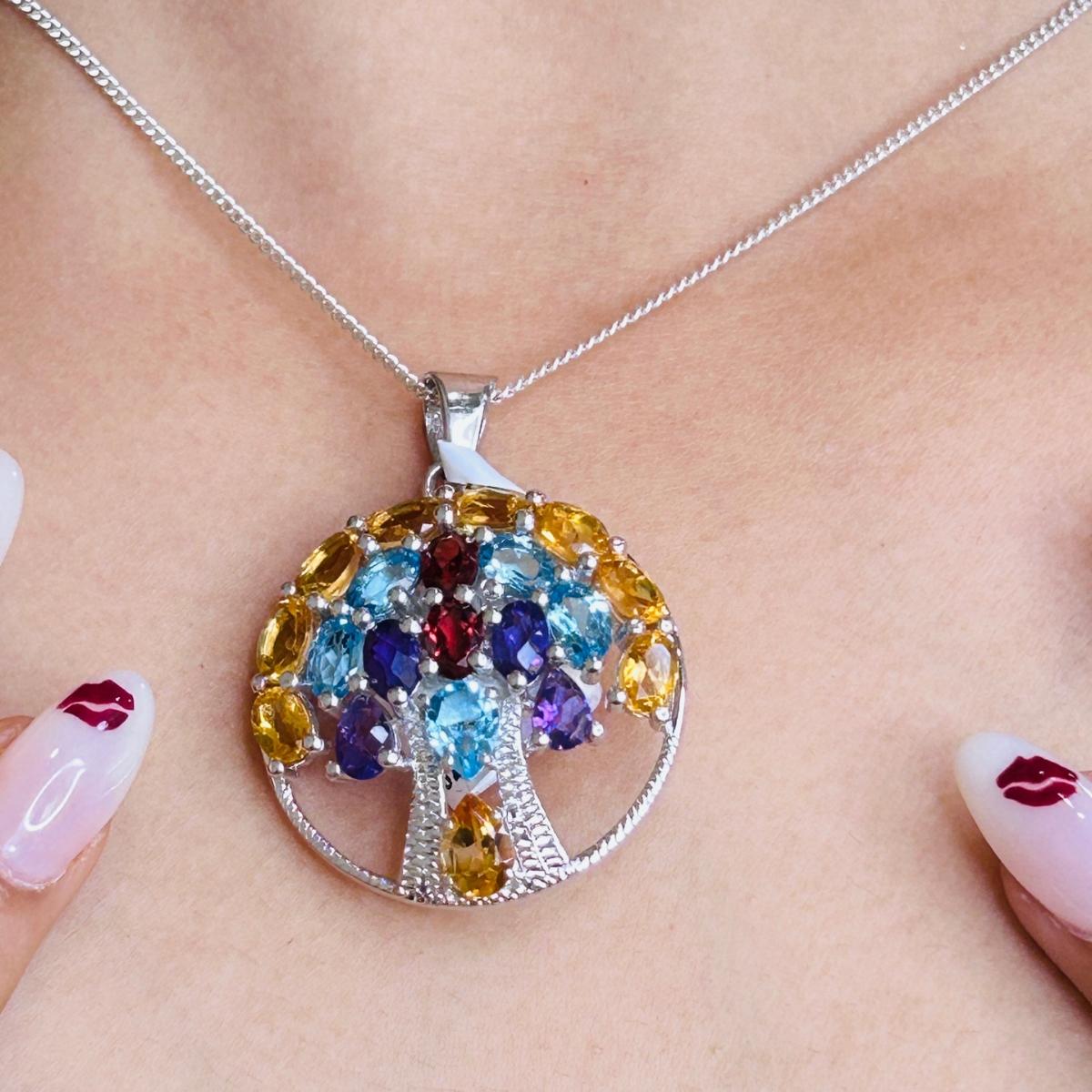 Art Deco Style Tree of Life Circle Multi Gemstone Pendant for Graduation Gift in sterling silver studded with round cut multi gemstone. This stunning piece of jewelry instantly elevates a casual look or dressy outfit. 
Multi Gemstone enhances the