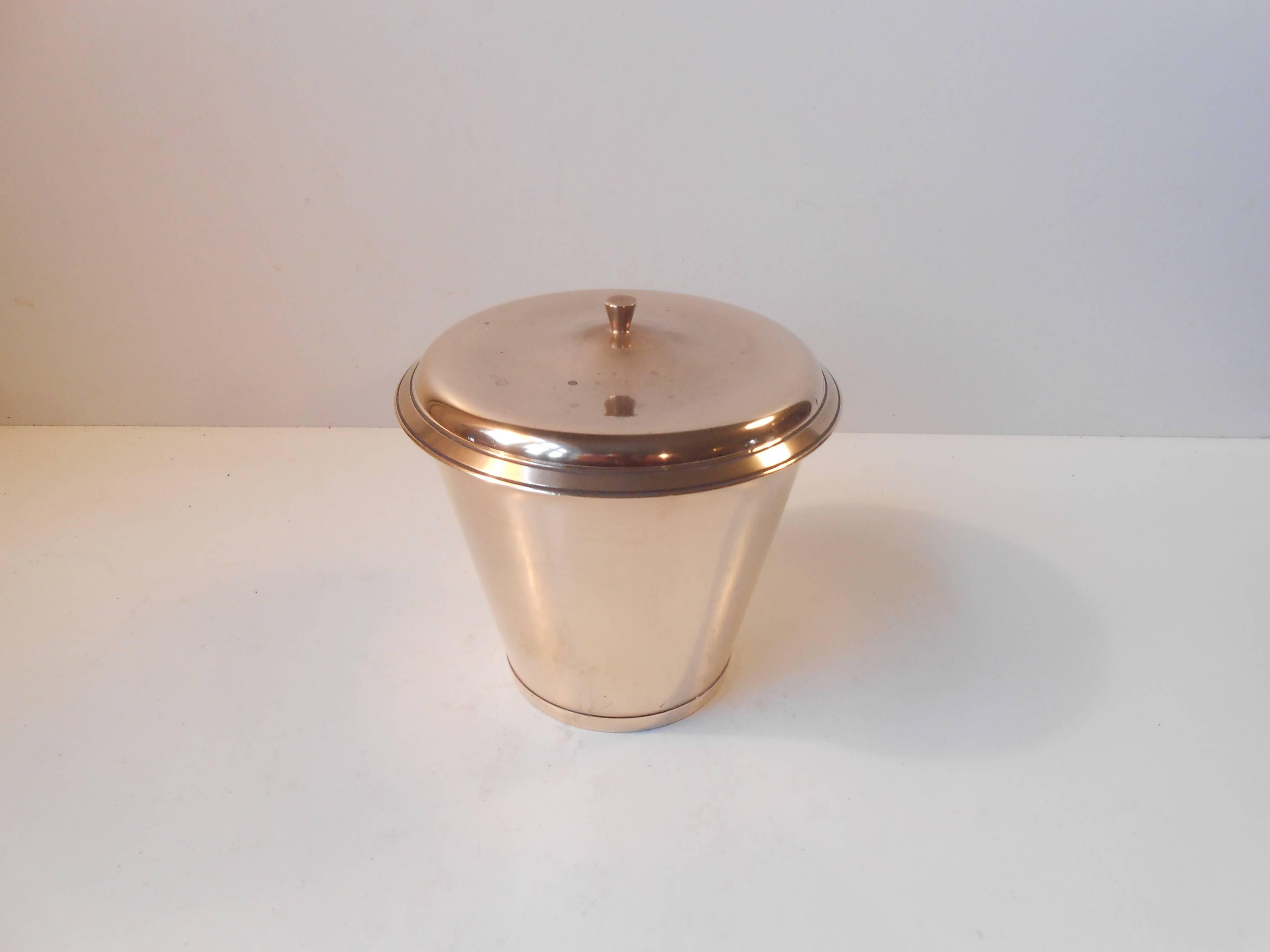 Beautiful lidded jar in solid bronze with pure and simple Art Deco lines and organically shaped lid. Manufactured and designed by Leon Hatot, ATO in France during the 1930s. It is stamped ATO, Bronce.
Hatot and his company ATO are mostly known for
