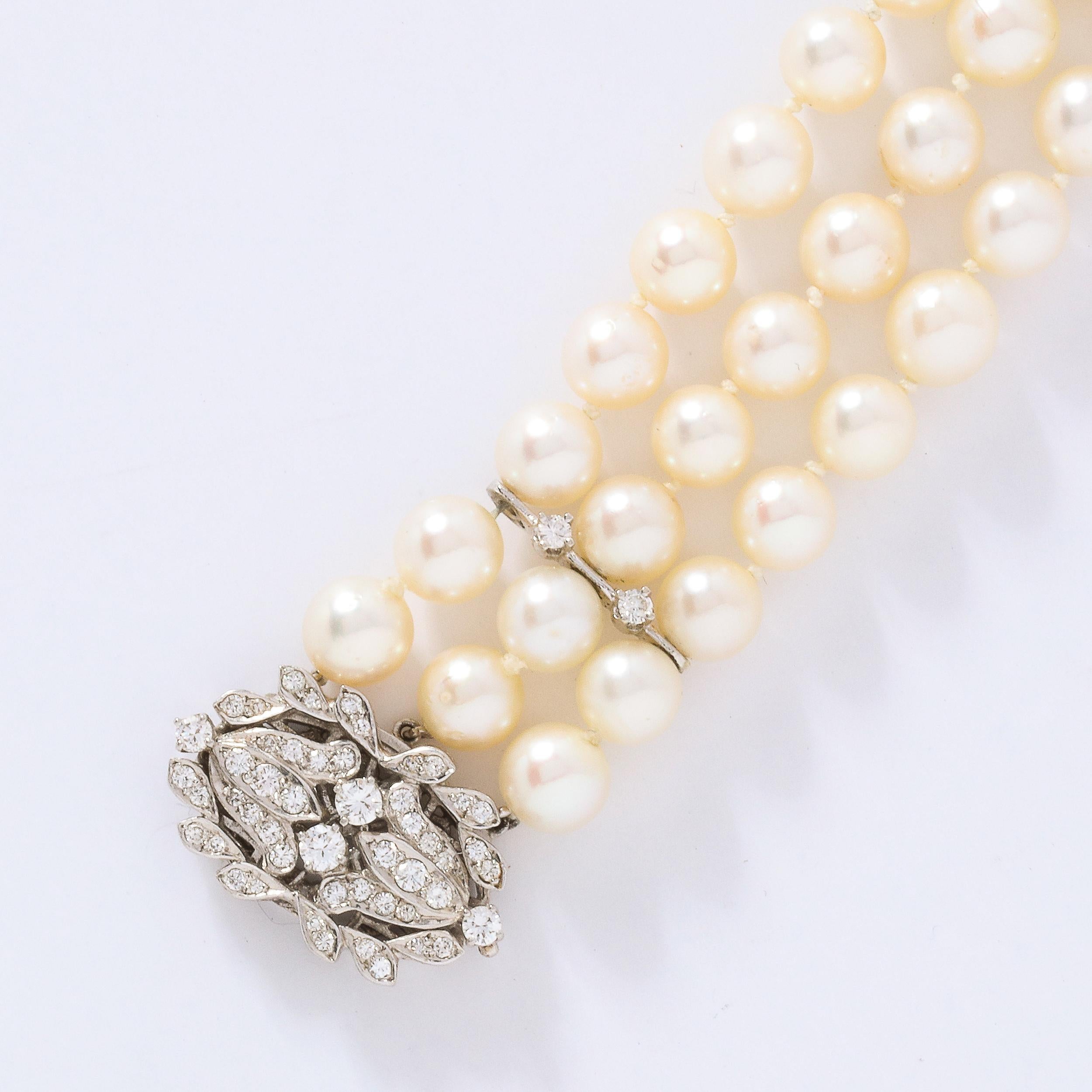 Brilliant Cut Art Deco Triple Strand Pearl, Gold and Diamond Bracelet