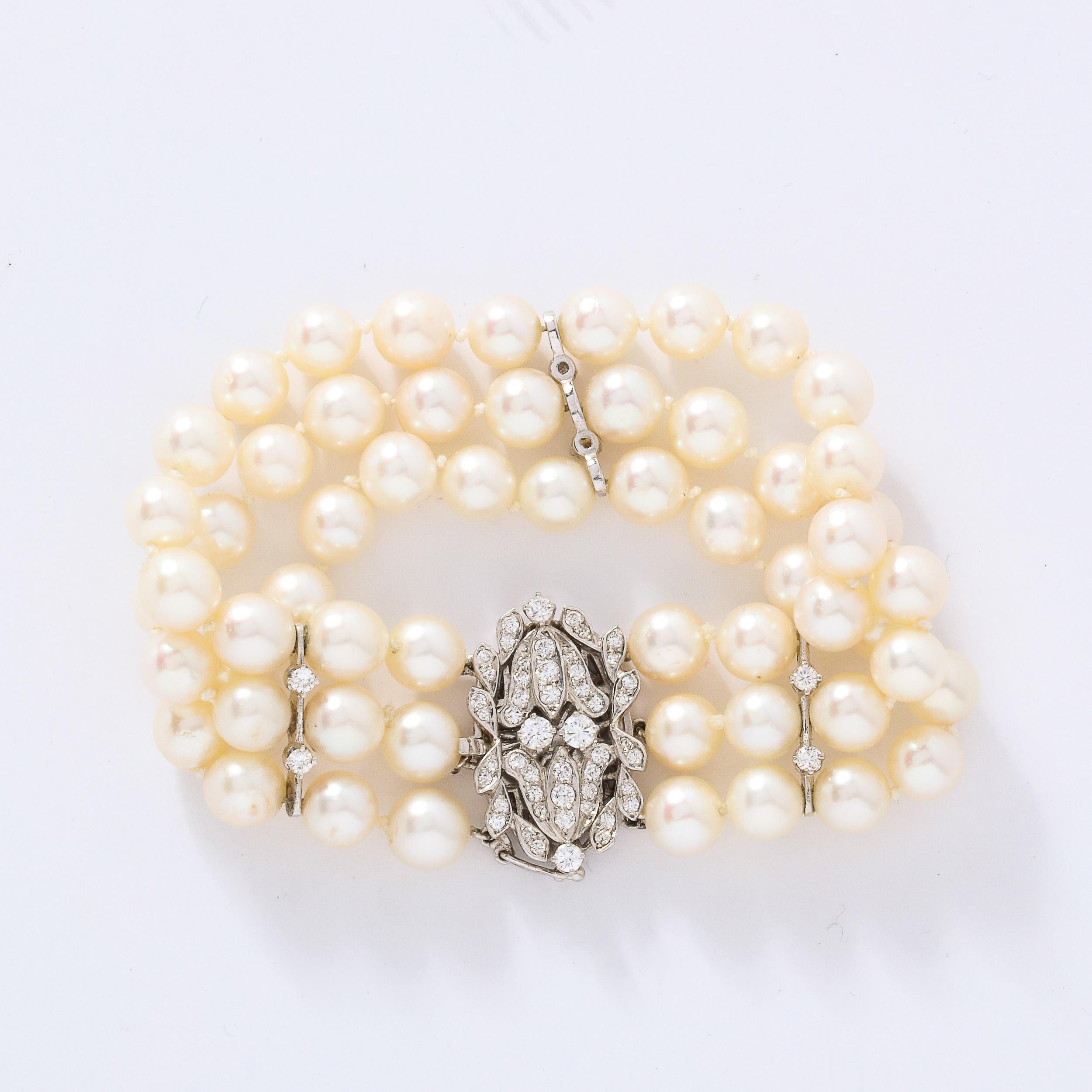Art Deco Triple Strand Pearl, Gold and Diamond Bracelet 1