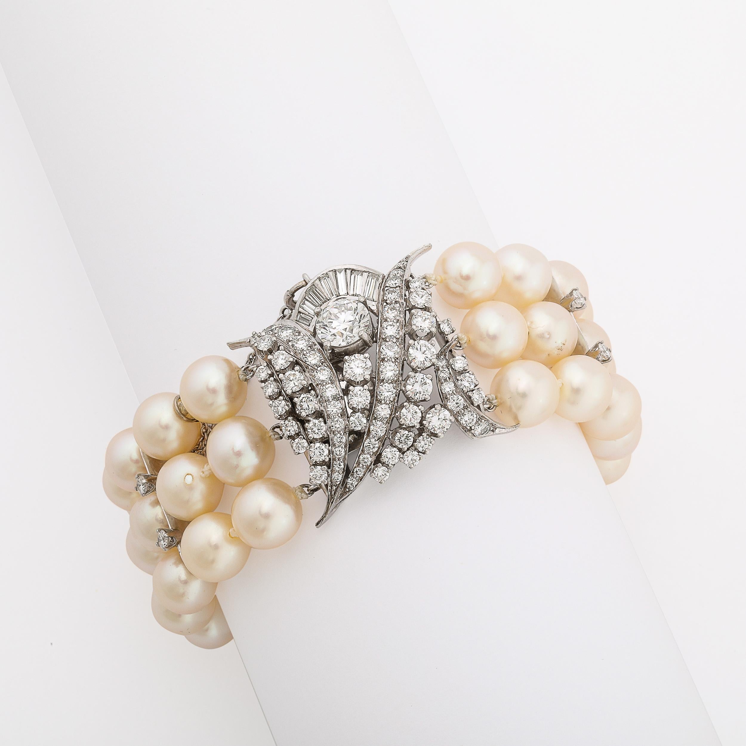 Art Deco Triple Strand Pearl, Platinum, & Diamond Bracelet In Excellent Condition In New York, NY