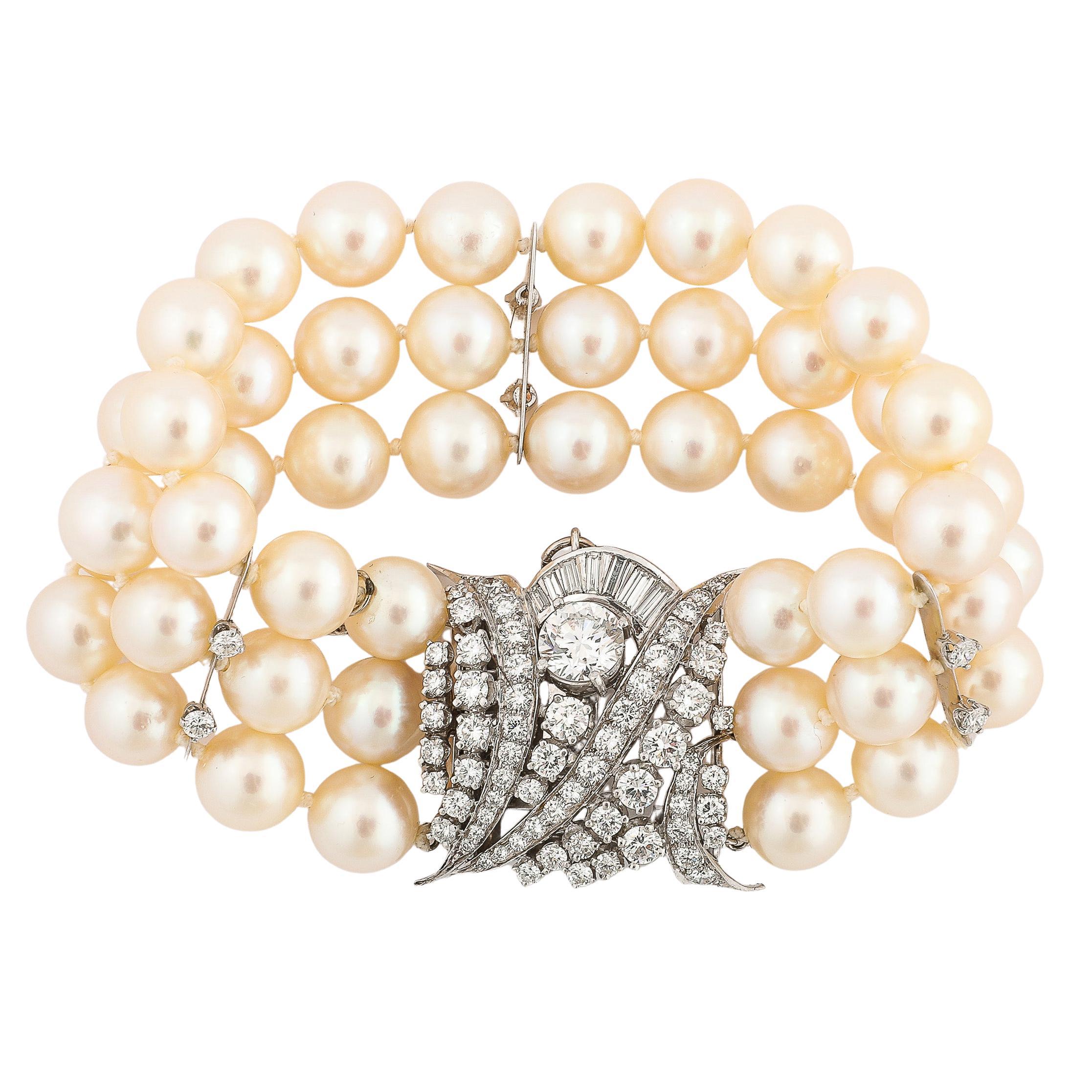 This elegant and sophisticated Art Deco Triple Strand Pearl, Platinum, & Diamond Bracelet originates from the United States, Circa 1945. This bracelet is highly wearable and attractive with a stunning composition of diamonds set in platinum with