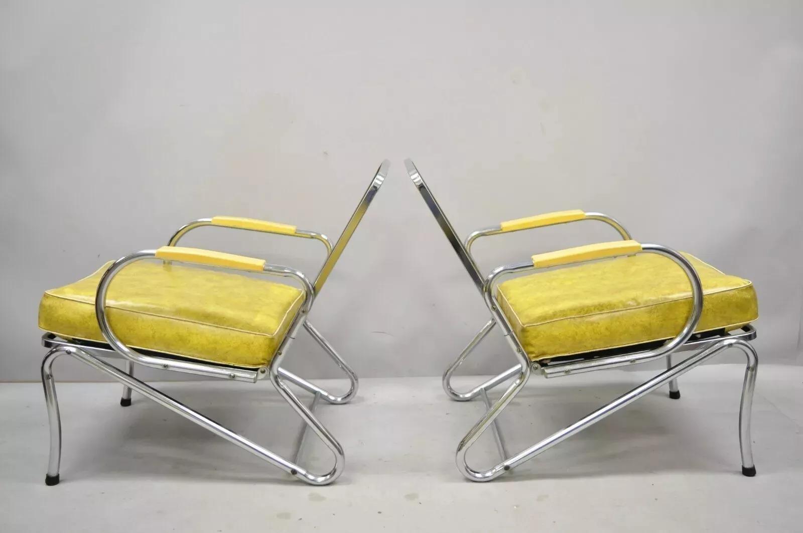 Pair of Art Deco Tubular Chrome Yellow Vinyl Club Lounge Arm Chairs Attributed to Lloyd Mfg. Item features the original vinyl cushions, metal frames, clean modernist lines, sleek sculptural form. Maker unconfirmed, but possibly by Kem Weber for
